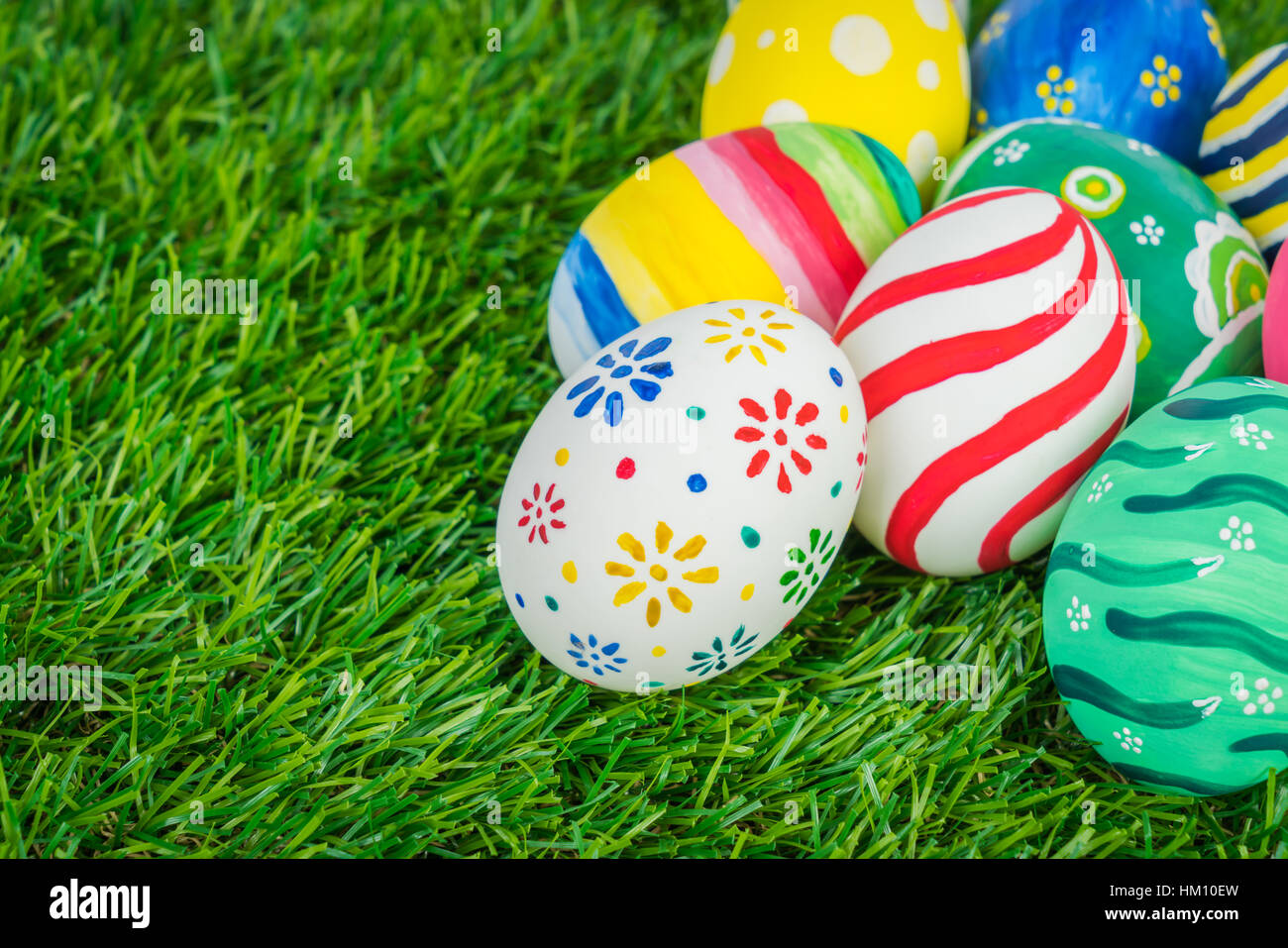 Easter Eggs on Fresh Green Grass Stock Photo - Alamy