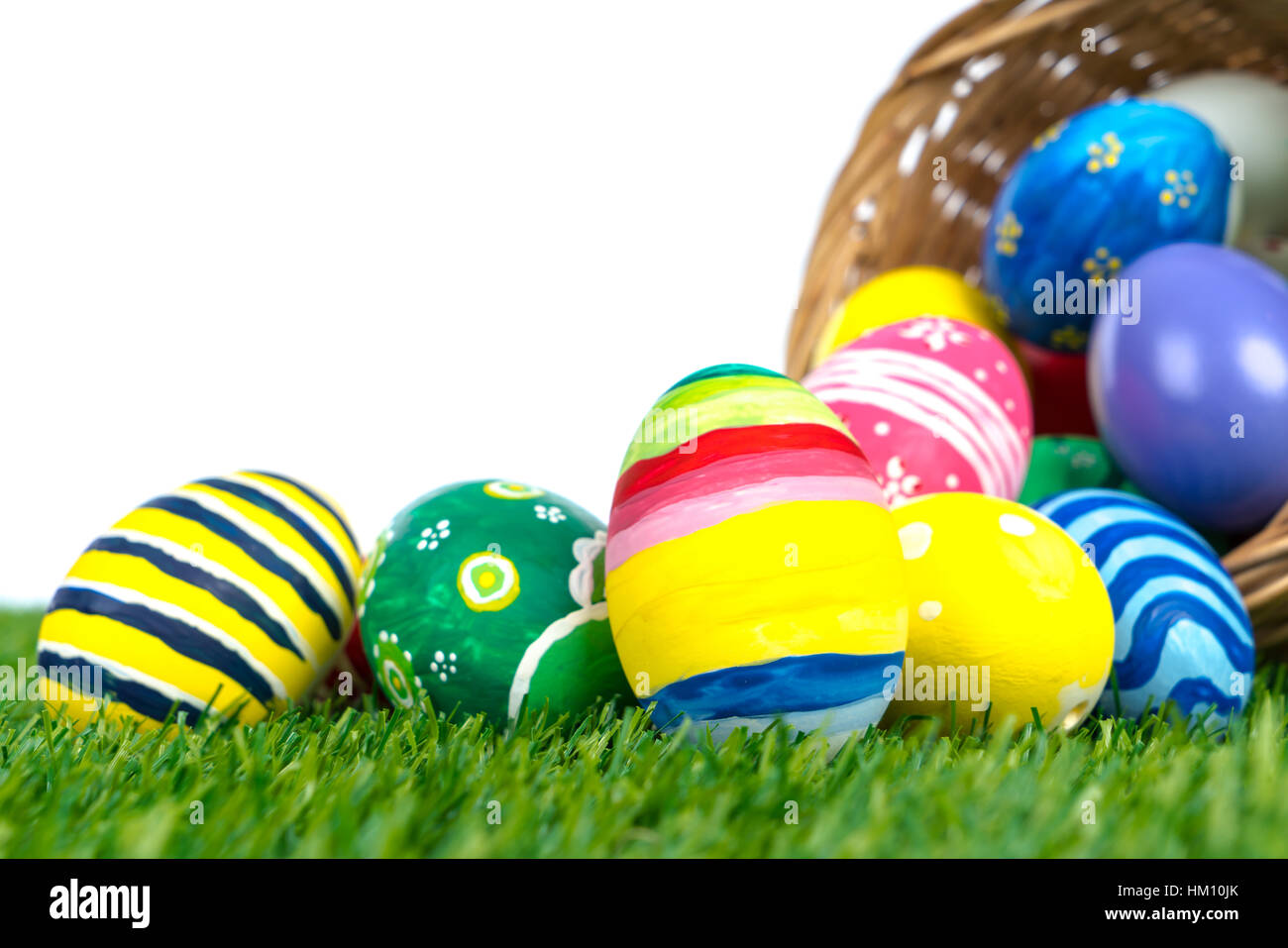 Easter Eggs on Fresh Green Grass over white background Stock Photo - Alamy