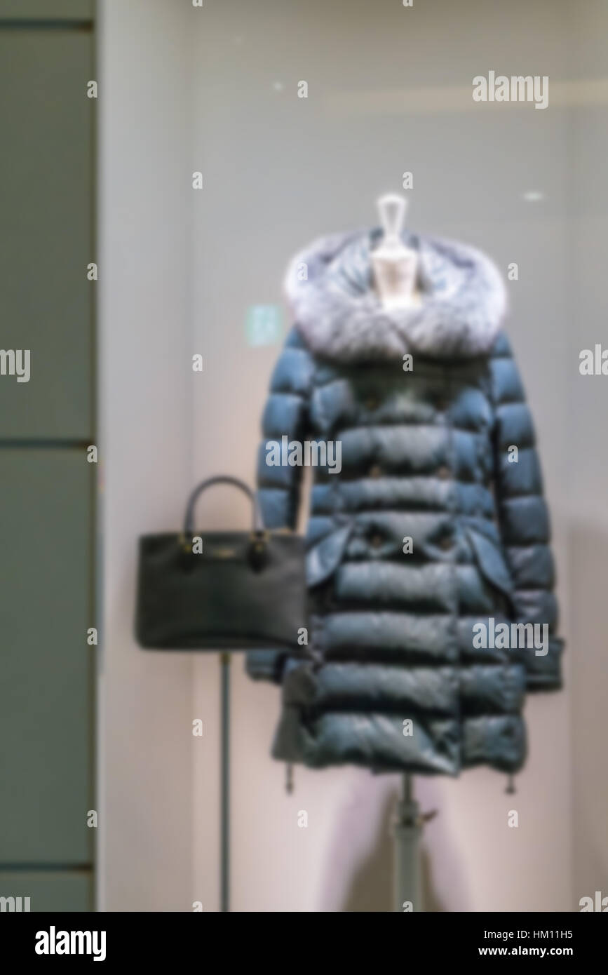 Model in shiny coat hi-res stock photography and images - Alamy