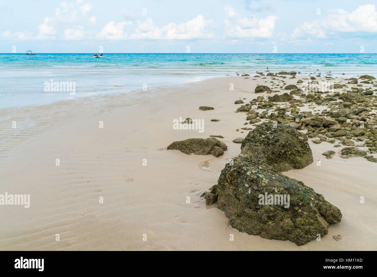 Beautiful white sand beach with blue sea and sky Stock Photo - Alamy