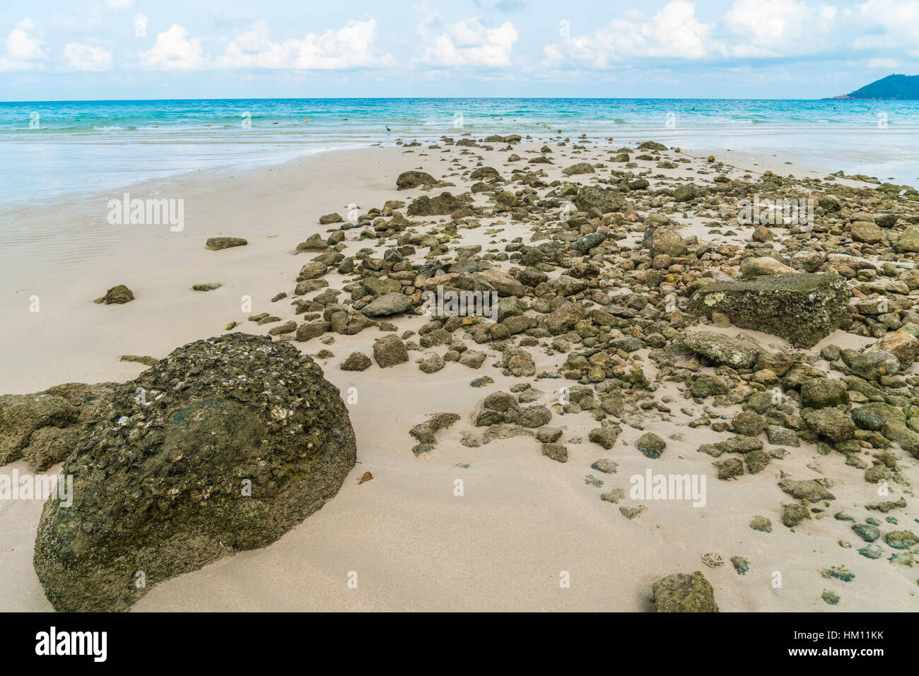 Beautiful white sand beach with blue sea and sky Stock Photo - Alamy