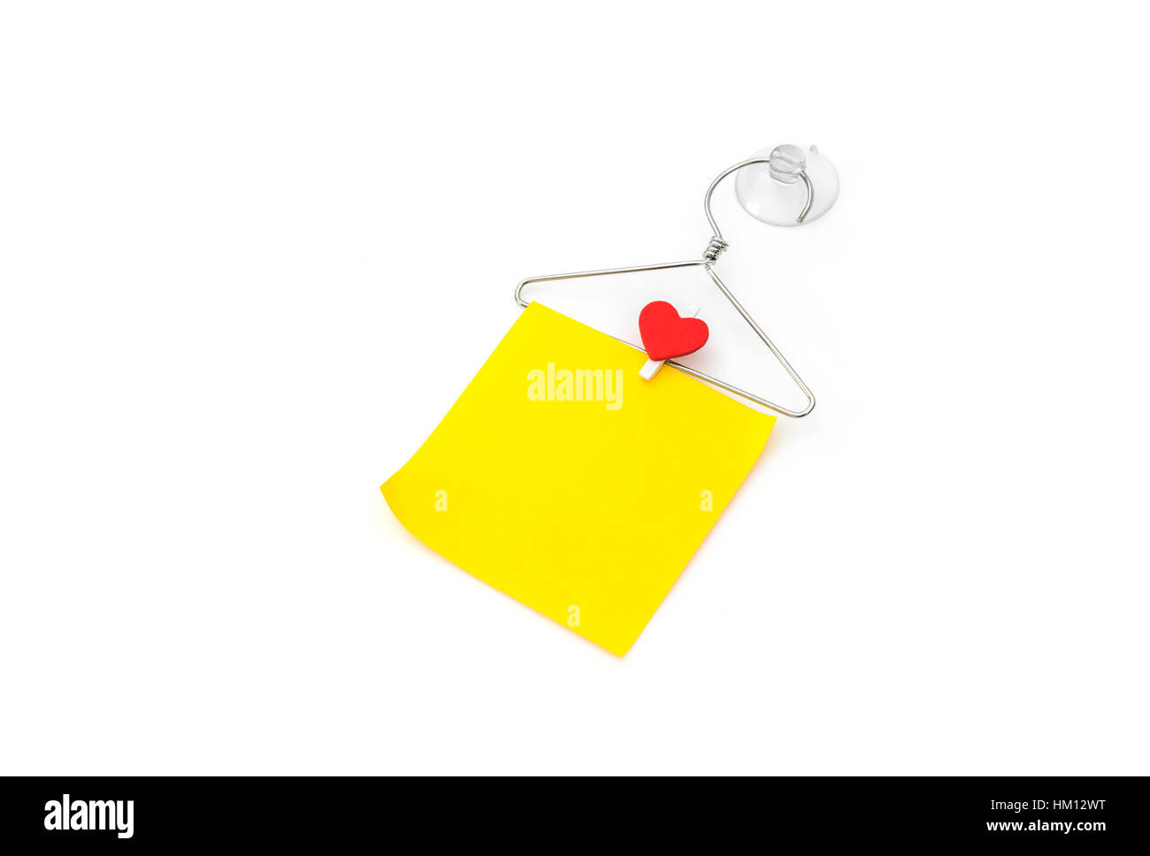 Red paper heart hanging on white background Stock Photo - Alamy
