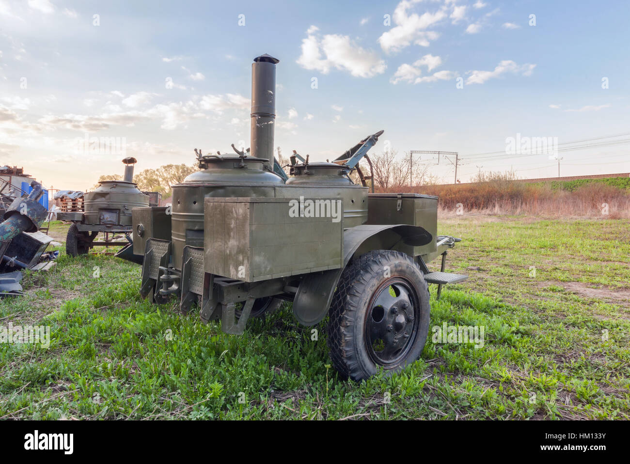 Old military trailer field kitchen on the grass Stock Photo Alamy