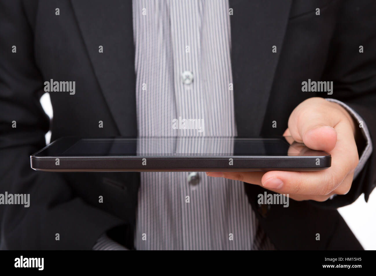 Business man using a touch screen device Stock Photo - Alamy