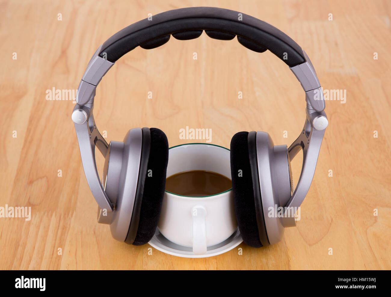Coffee cup and headphones Stock Photo - Alamy