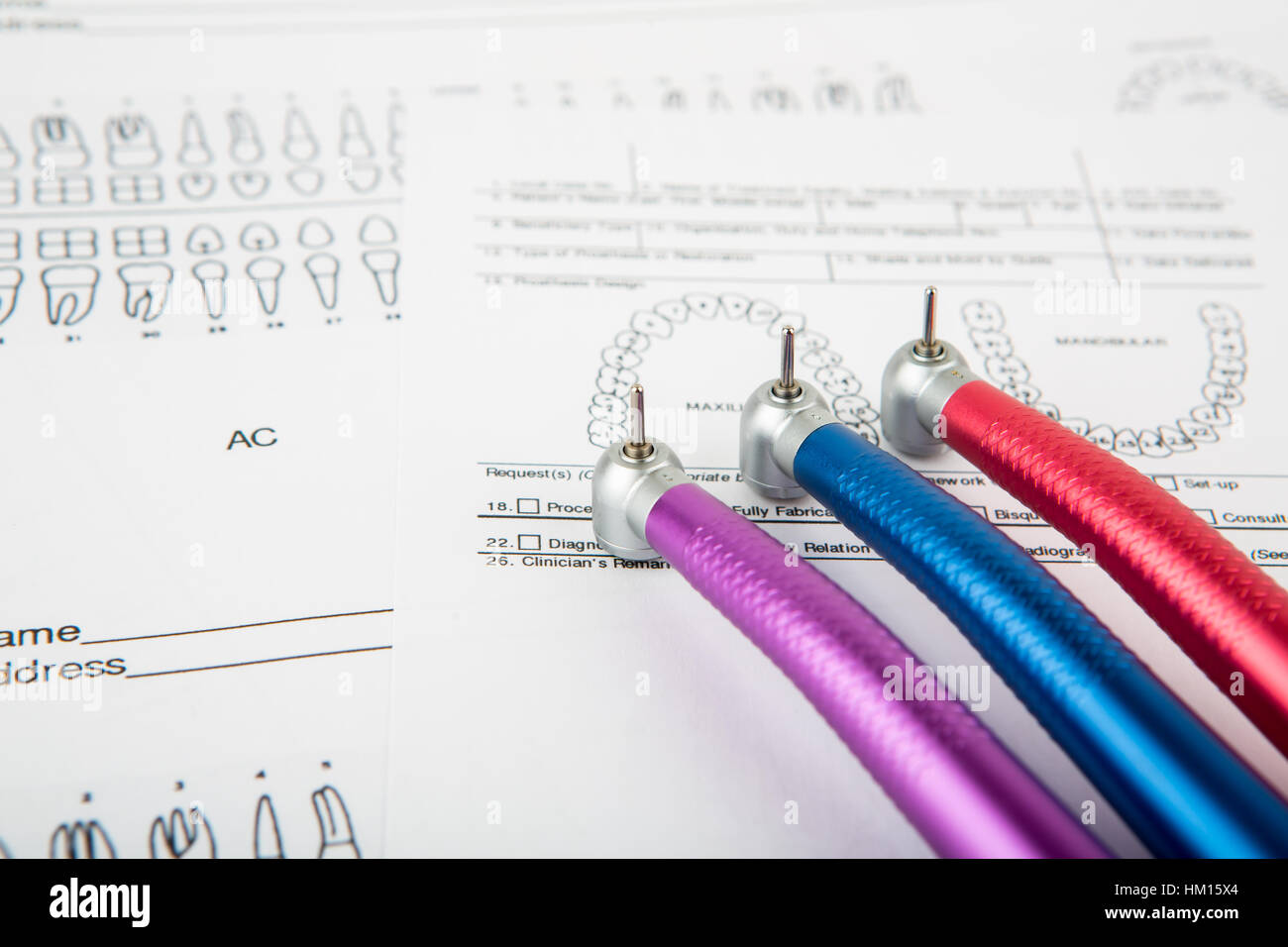 Dental tools and equipment on dental chart Stock Photo Alamy