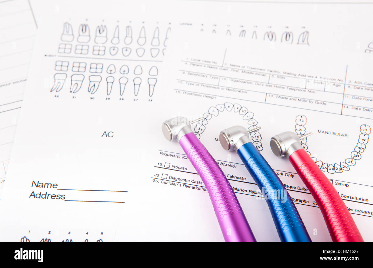 Dental tools and equipment on dental chart Stock Photo Alamy