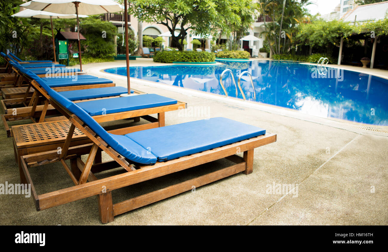 Swimming pool with relaxing seats Stock Photo Alamy
