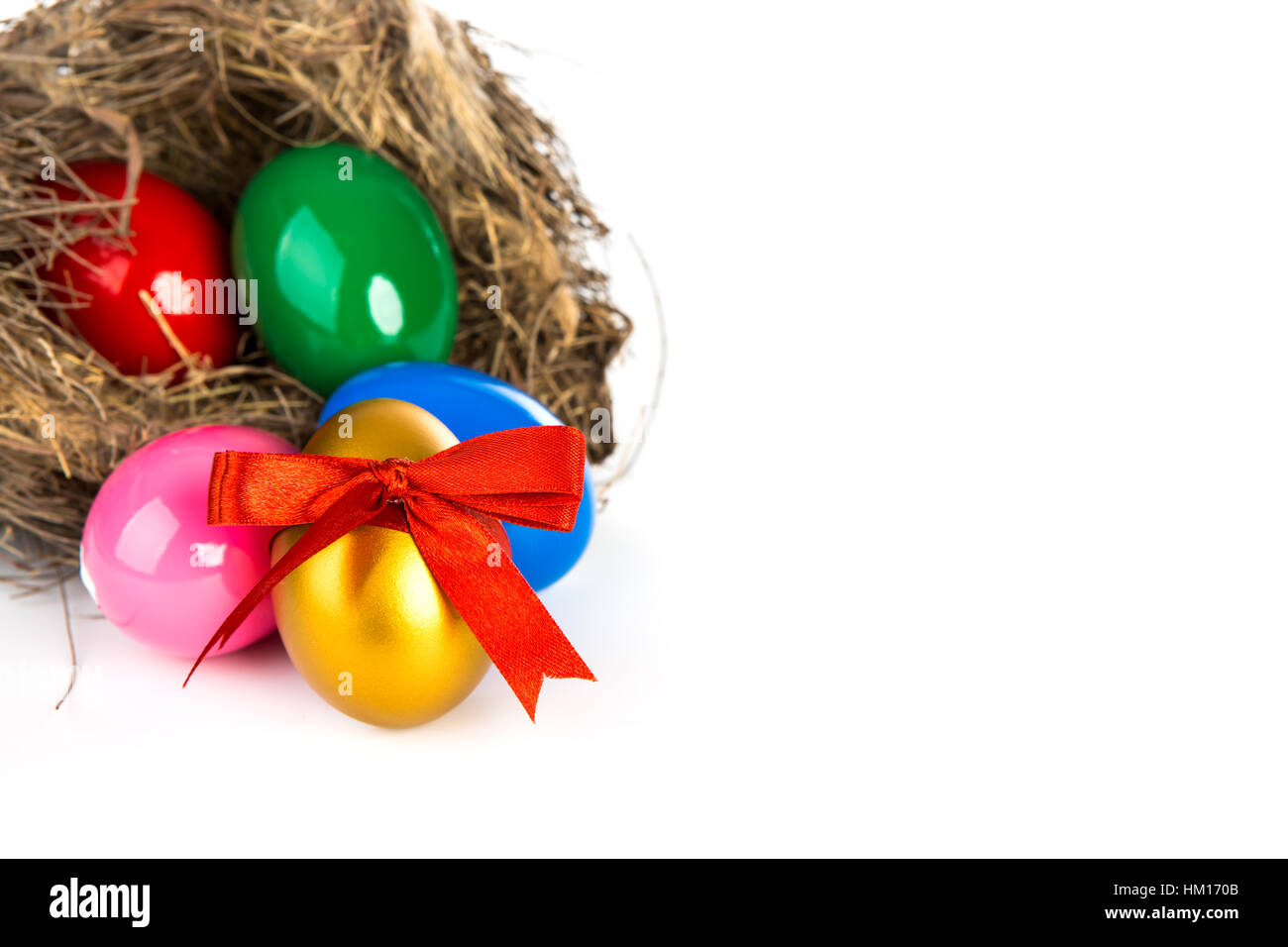 Colorful Easter eggs in a nest from branches on white background Stock ...
