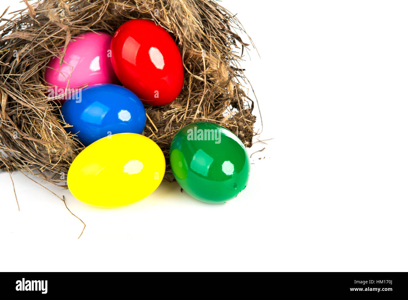 Colorful Easter eggs in a nest from branches on white background Stock ...