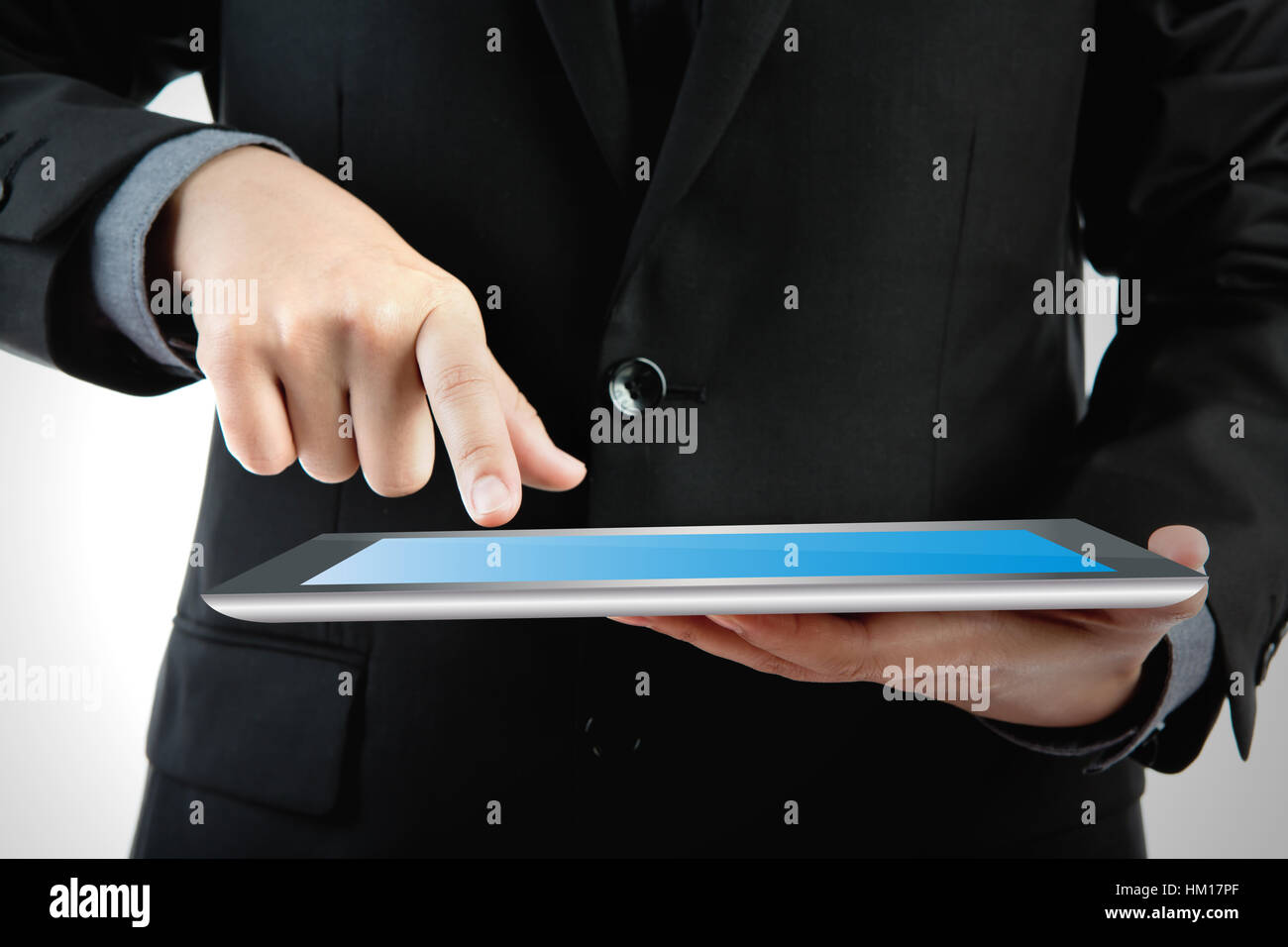 Business man using a touch screen device Stock Photo - Alamy