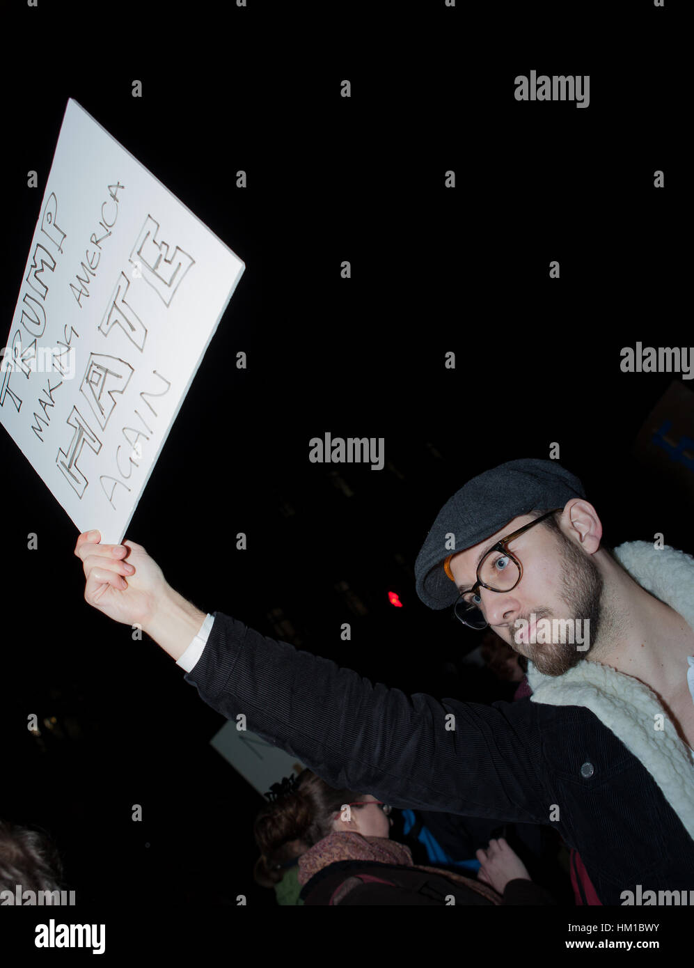 London, UK. 30th Jan, 2017. A protester during a demonstration outside Downing Street, in opposition to Donald Trump's travel ban targeting seven predominantly Muslim countries. Credit: Jo Syz/Alamy Live News Stock Photo