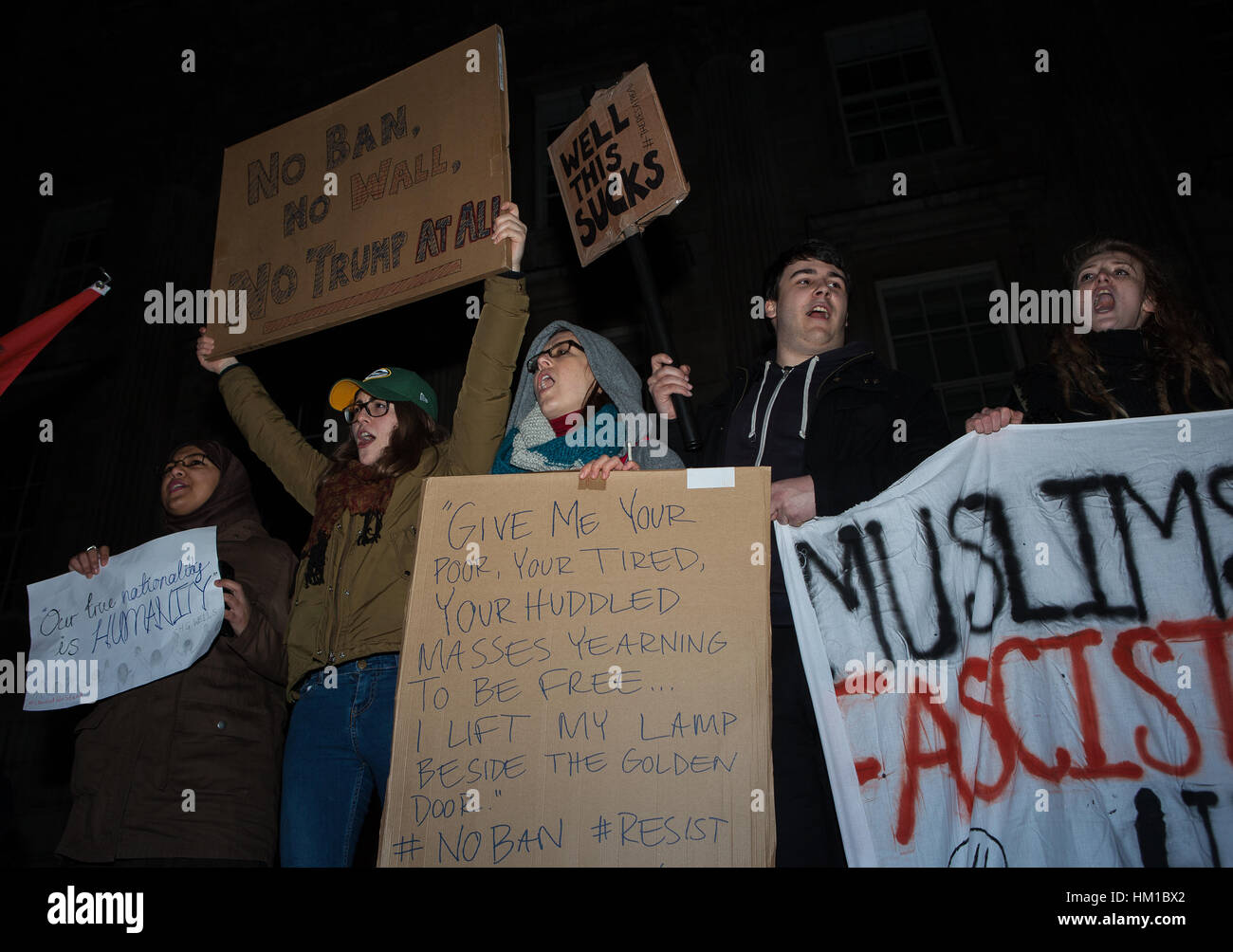 London, UK. 30th Jan, 2017. Protesters during a demonstration outside Downing Street, in opposition to Donald Trump's travel ban targeting seven predominantly Muslim countries. Credit: Jo Syz/Alamy Live News Stock Photo