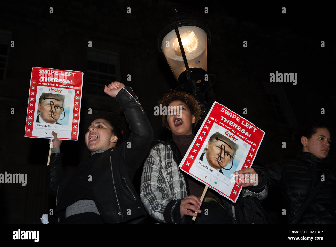 London, UK. 30th Jan, 2017. Protesters during a demonstration outside Downing Street, in opposition to Donald Trump's travel ban targeting seven predominantly Muslim countries. Credit: Jo Syz/Alamy Live News Stock Photo