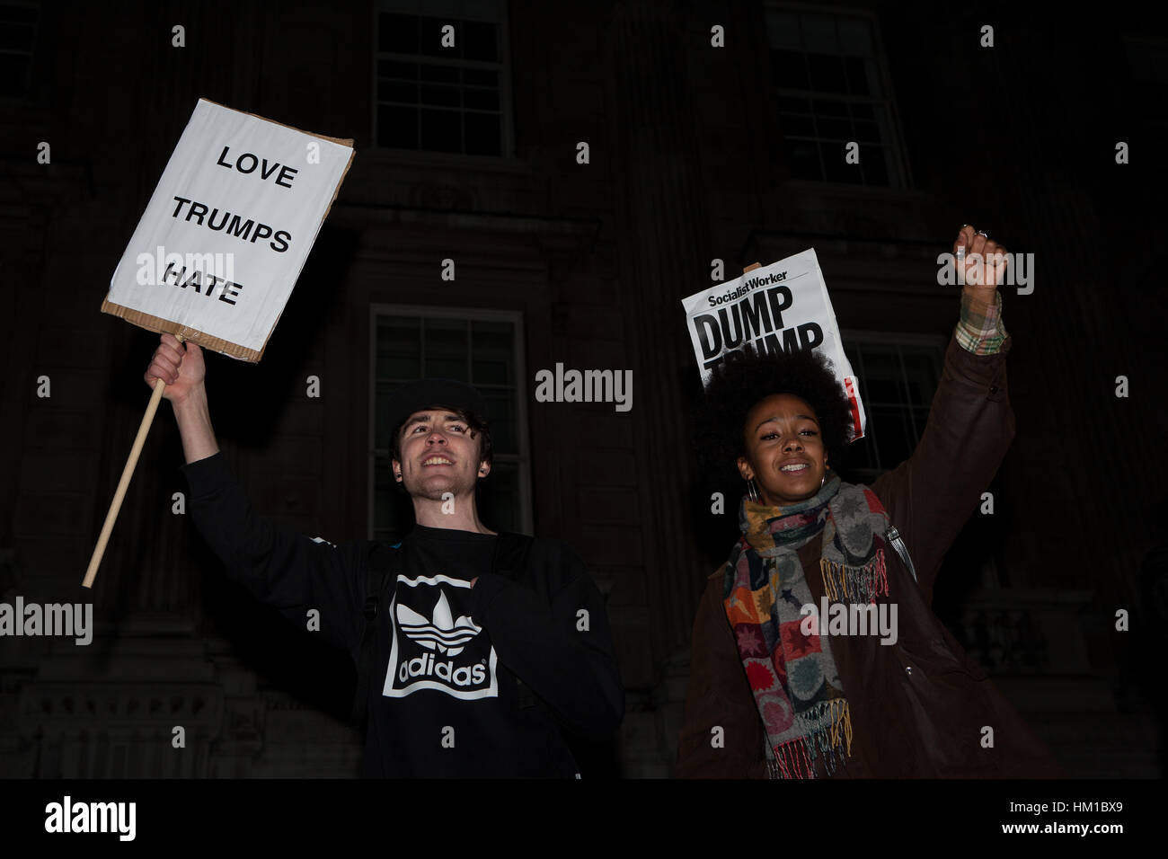 London, UK. 30th Jan, 2017. Protesters during a demonstration outside Downing Street in opposition to Donald Trump's travel ban targeting seven predominantly Muslim countries. Credit: Jo Syz/Alamy Live News Stock Photo