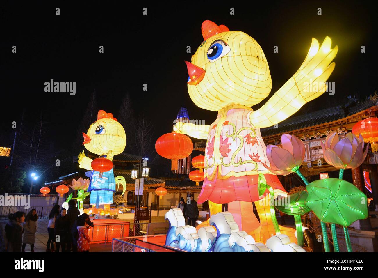 Jinan, China. 30th Jan, 2017. Tourists visit the 38th Baotu Spring ...