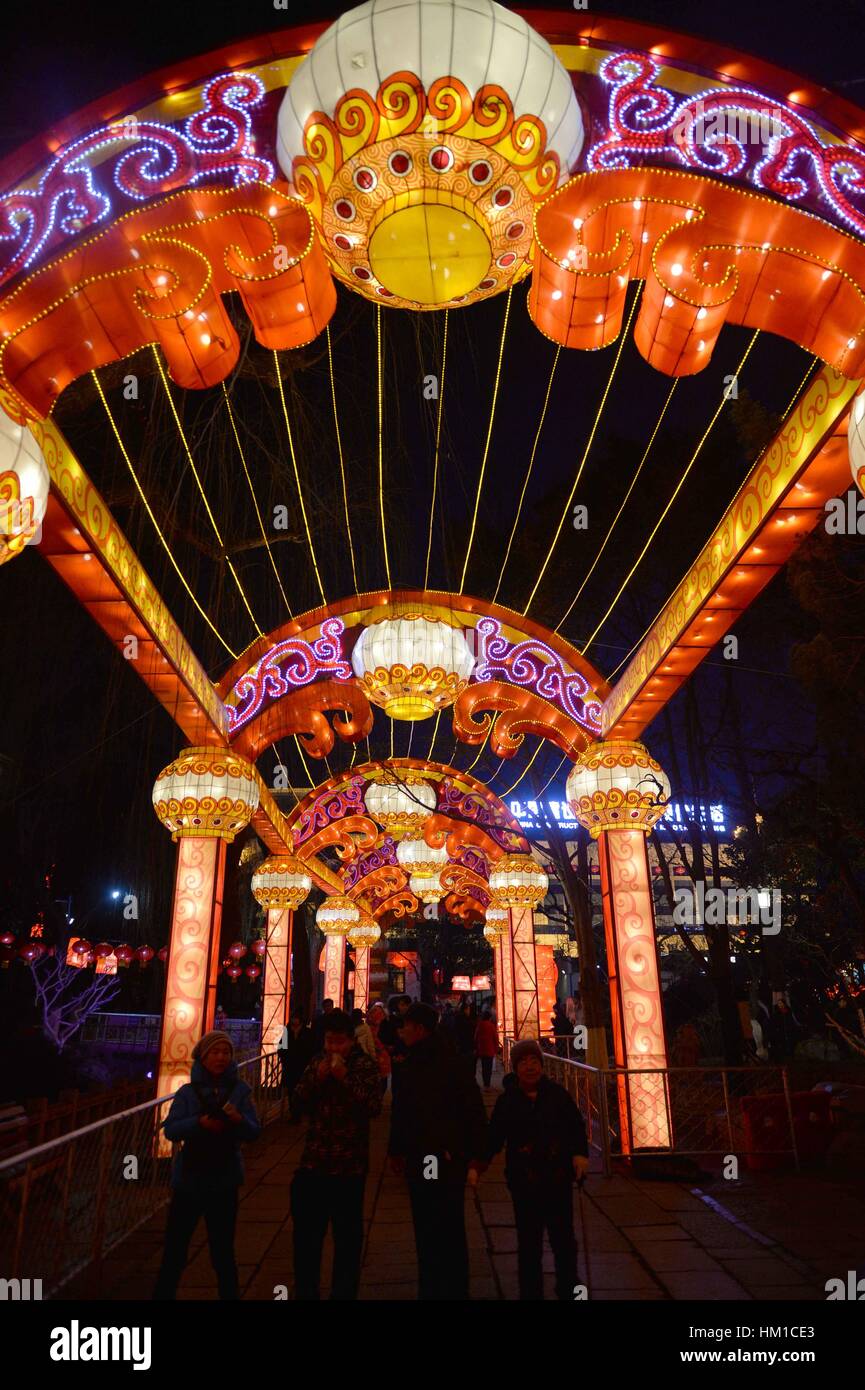 Jinan, China. 30th Jan, 2017. Tourists visit the 38th Baotu Spring ...