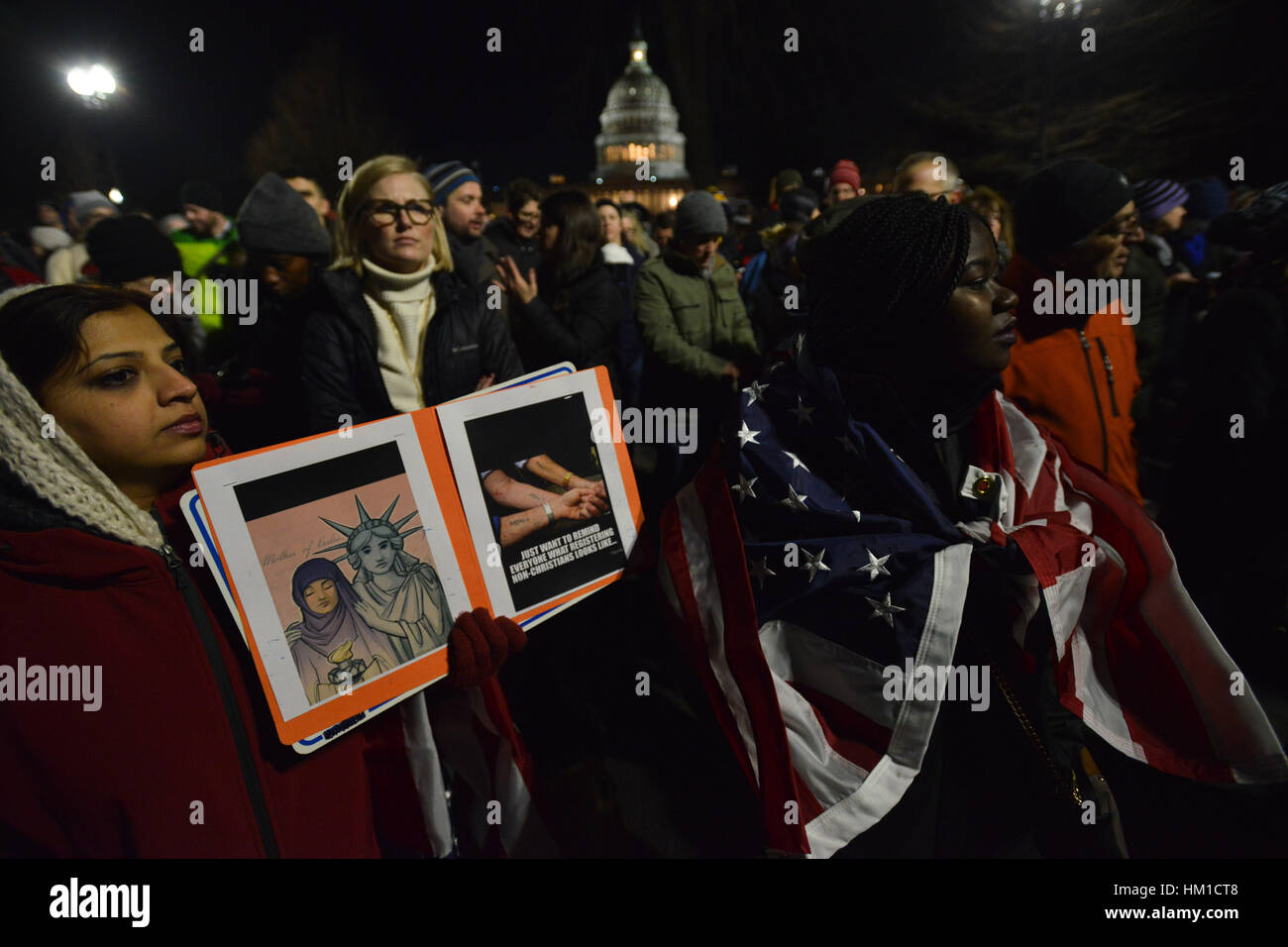 Washington, USA. 30th Jan, 2017. Hundreds gather in front of the U.S. Supreme Court in Washington D.C. to protest President Trump's travel ban targeting refugees and citizens of seven majority Muslim nations. Congressional Democrats attended the demonstration, a continuation of protests accross the nation that began after Trump signed the executive order. Credit: Miguel Juarez Lugo/ZUMA Wire/Alamy Live News Stock Photo