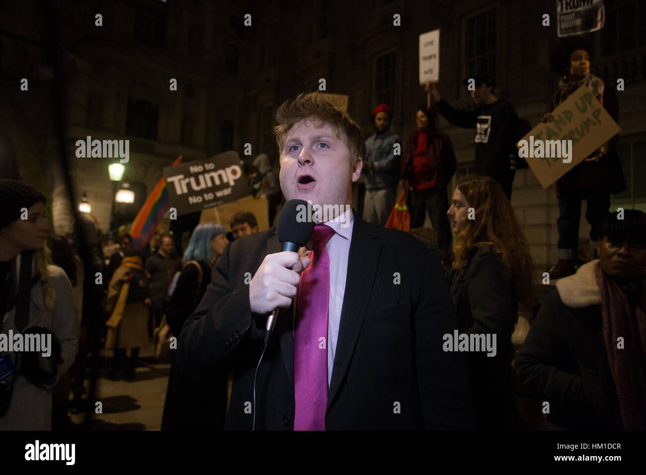 London, UK. 30th Jan, 2017. Political Journalist - Andre Walker shows up in support of Trump at the Emergency Demo against Trump's Muslim Ban. Credit: Aimvphotography/Alamy Live News Stock Photo