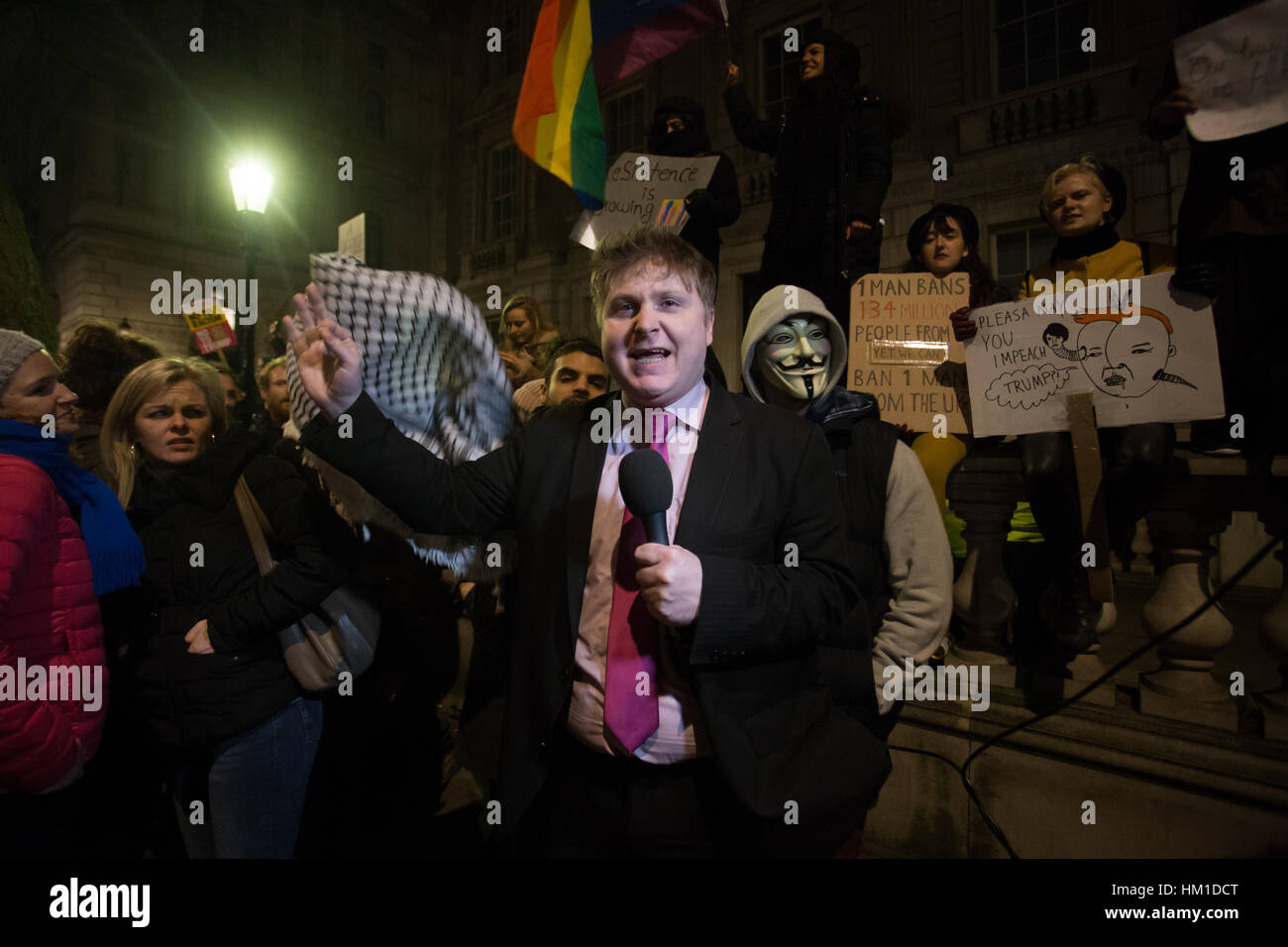 London, UK. 30th Jan, 2017. Political Journalist - Andre Walker voicing his support for Trump to the annoyance of the  surrounding protesters at the Emergency Demo against Trump's Muslim Ban. Credit: Aimvphotography/Alamy Live News Stock Photo