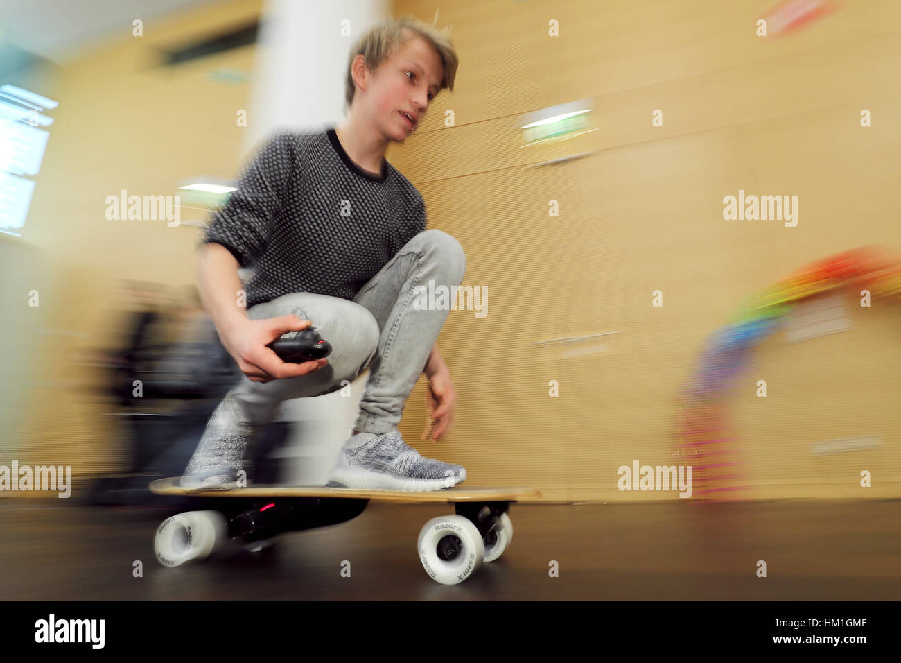 Nuremberg, Germany. 31st Jan, 2017. Malte rides the electric skateboard