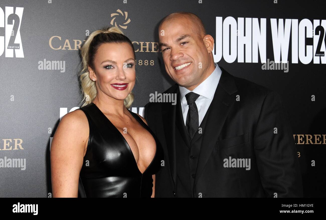 Los Angeles, CA, USA. 30th Jan, 2017. Tito Ortiz, Amber Nicole Miller at arrivals for JOHN WICK: CHAPTER TWO Premiere, Arclight Hollywood, Los Angeles, CA January 30, 2017. Credit: Dee Cercone/Everett Collection/Alamy Live News Stock Photo