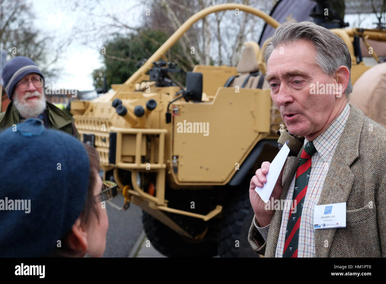 Hereford, UK. 1st February 2017. A retired military officer and Expo delegate talks with the protesters outside the Herefordshire Defence and Security Expo ( HDSE ) event held at The Courtyard arts centre. The event features exhibitors and speakers from the defence industry among them QinetiQ, the Ministry of Defence and the Department of International Trade. The protesters included local Quakers and members of the Campaign Against Arms Trade ( CAAT ).  Photograph Steven May / Alamy Live News Stock Photo