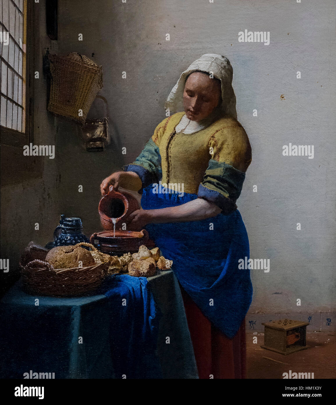 The Milkmaid, by Johannes Vermeer, circa 1660, Rijksmuseum, Amsterdam, Netherlands, Europe Stock Photo