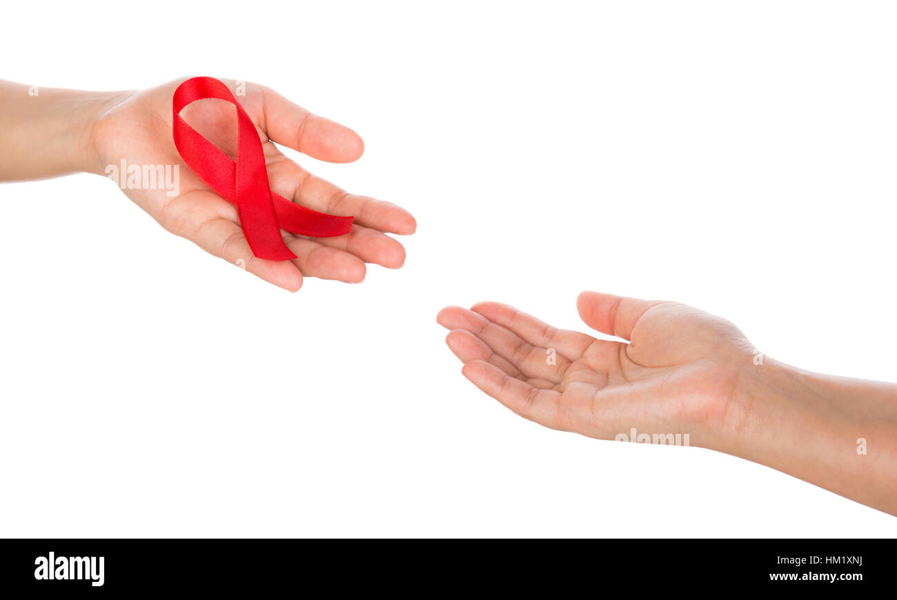 AIDS ribbon in hand isolated on white background Stock Photo - Alamy