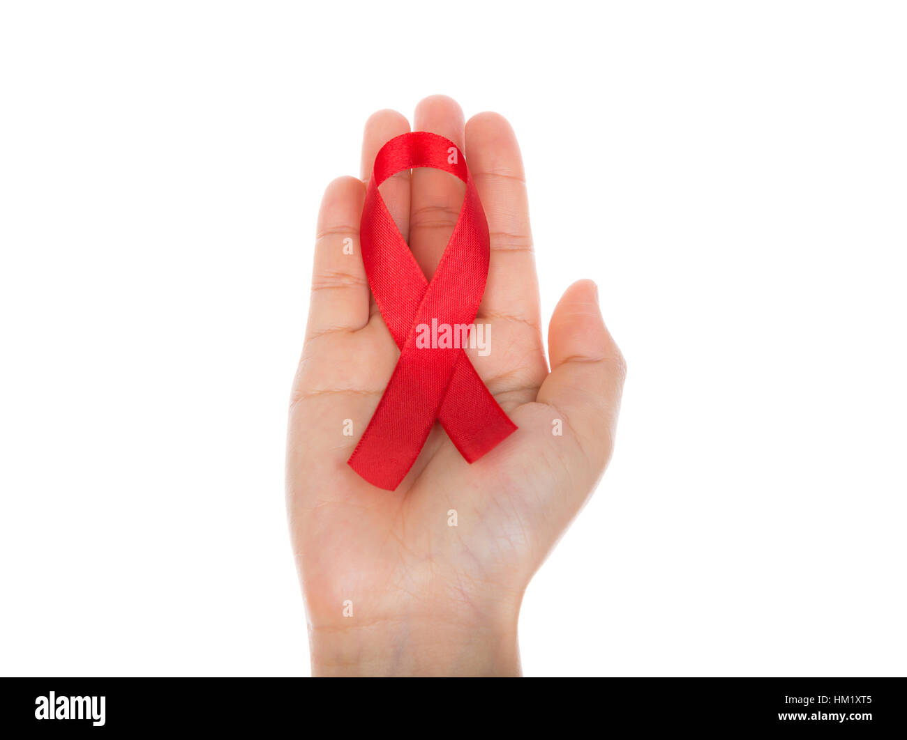 AIDS ribbon in hand isolated on white background Stock Photo - Alamy