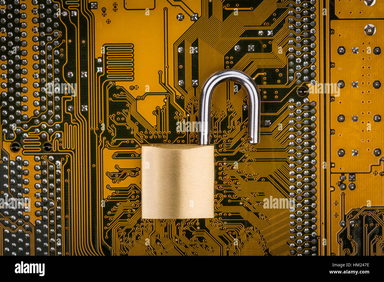 Protection concept : security lock on computer circuit board Stock ...