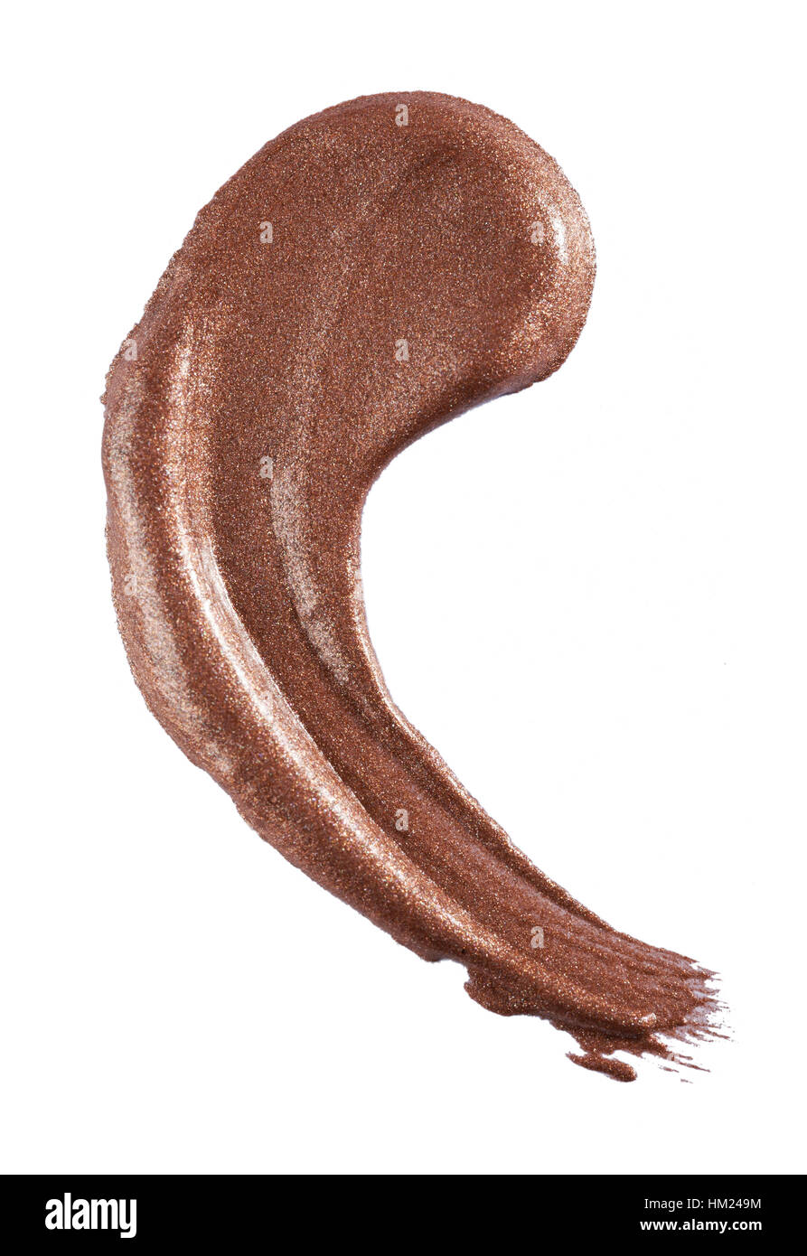 A cut out beauty image of a sample of bronze lip gloss. Stock Photo
