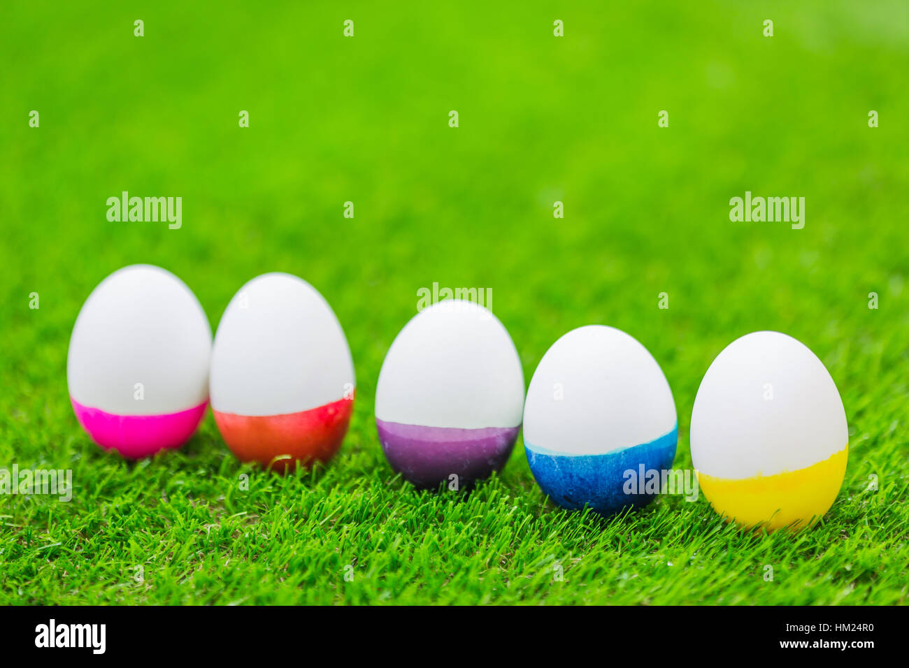 Easter Eggs on Fresh Green Grass Stock Photo - Alamy