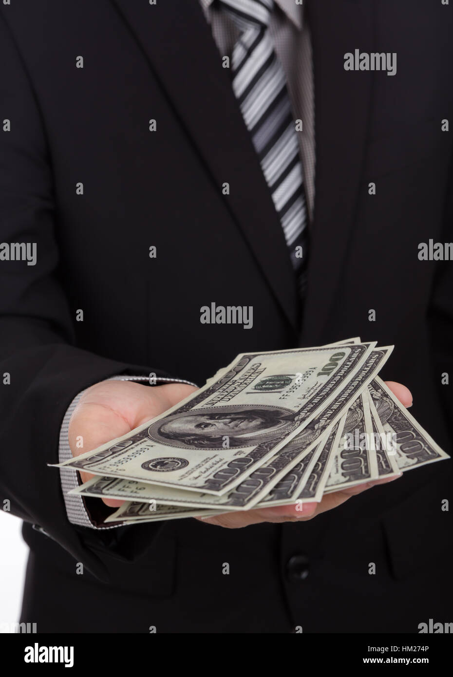 Business man Displaying a Spread of Dollar Stock Photo - Alamy