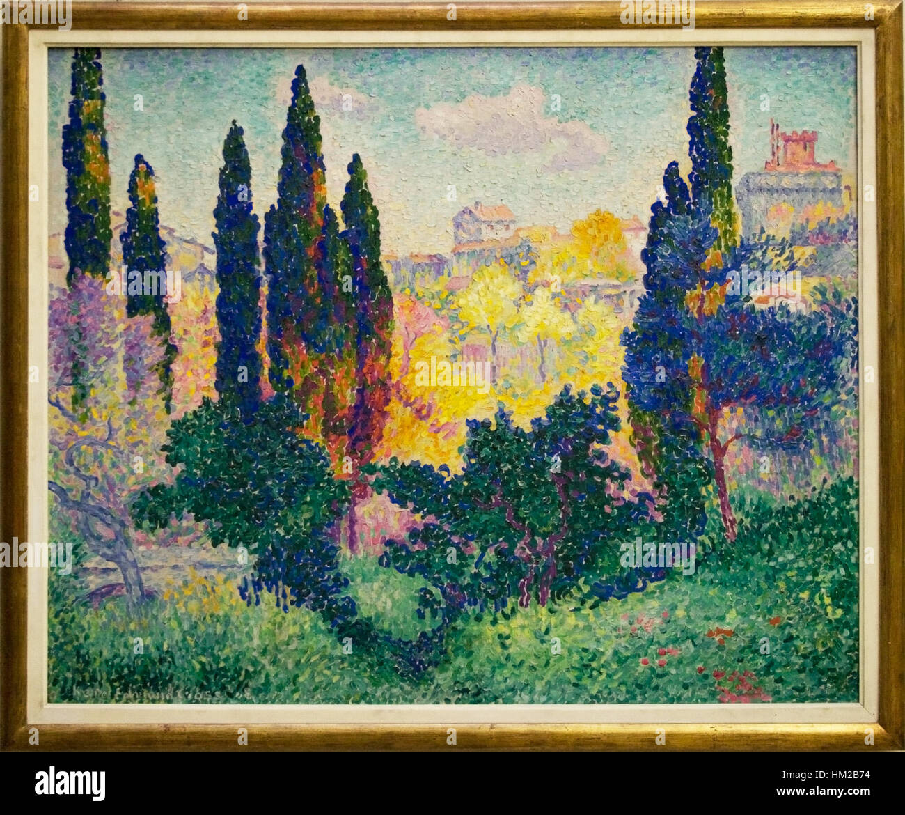 'Les Cyprès à Cagnes' is a painting by French artist Henri Matisse, depicting a serene landscape of cypress trees in Cagnes-sur-Mer. The work showcases Matisse's characteristic use of bold colors and expressive brushwork, typical of his post-Impressionist style. Stock Photo