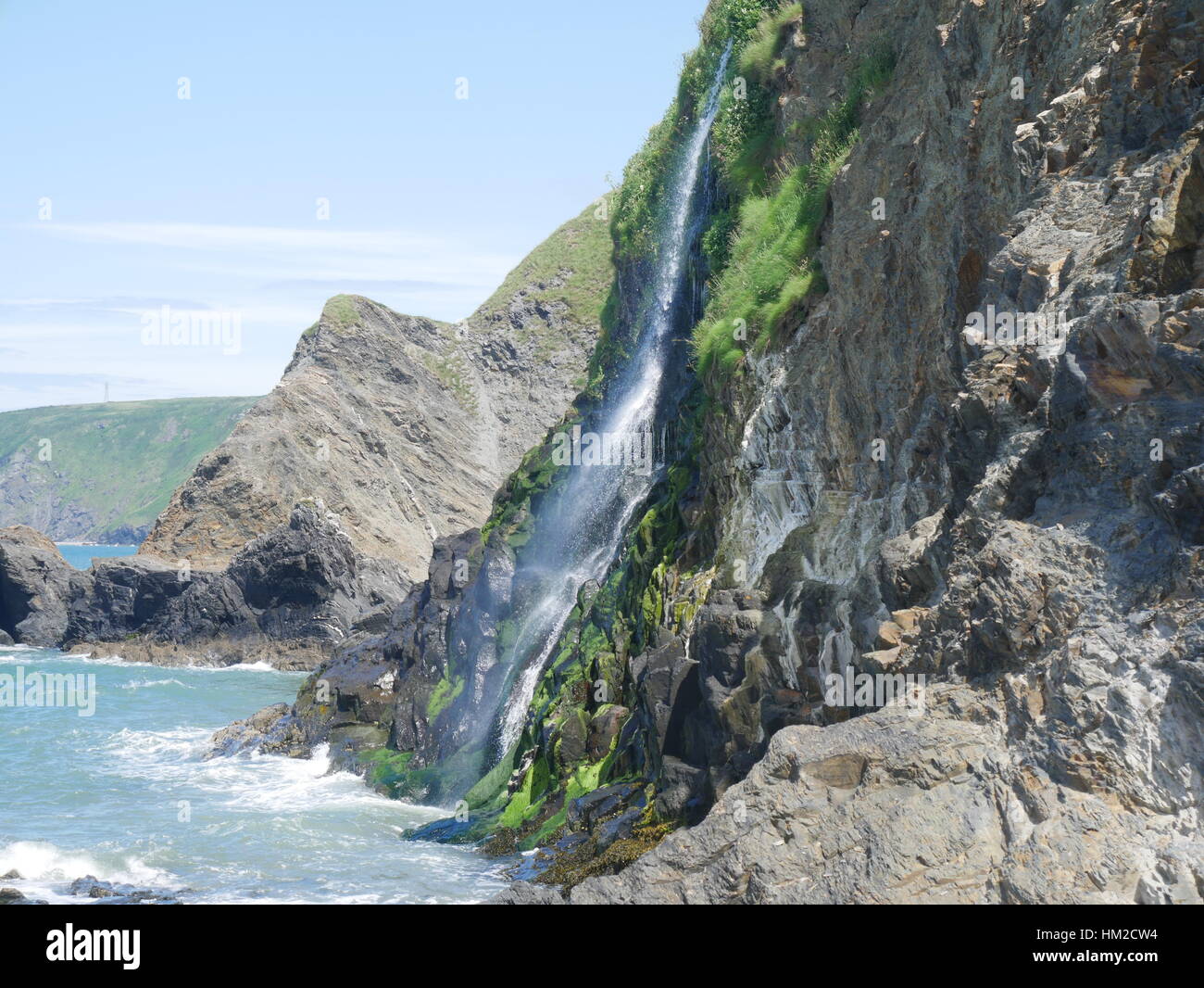 Cliff waterfall, Aberporth, Cardigan Bay, Wales, UK Stock Photo Alamy