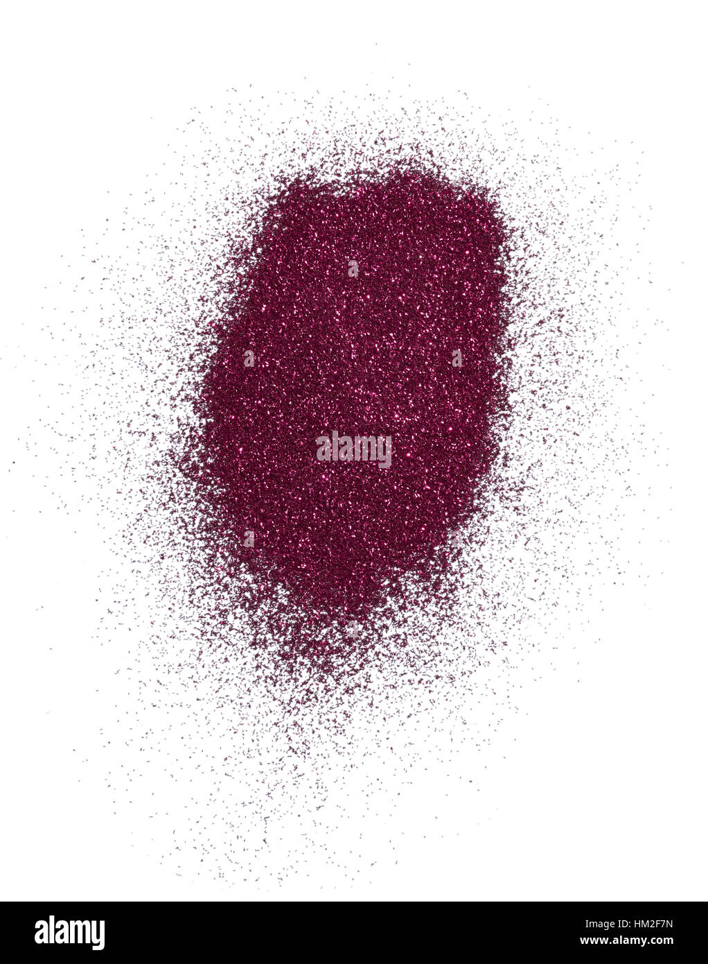 A cut out beauty image of a sample of metallic pink dust or glitter powder. Stock Photo