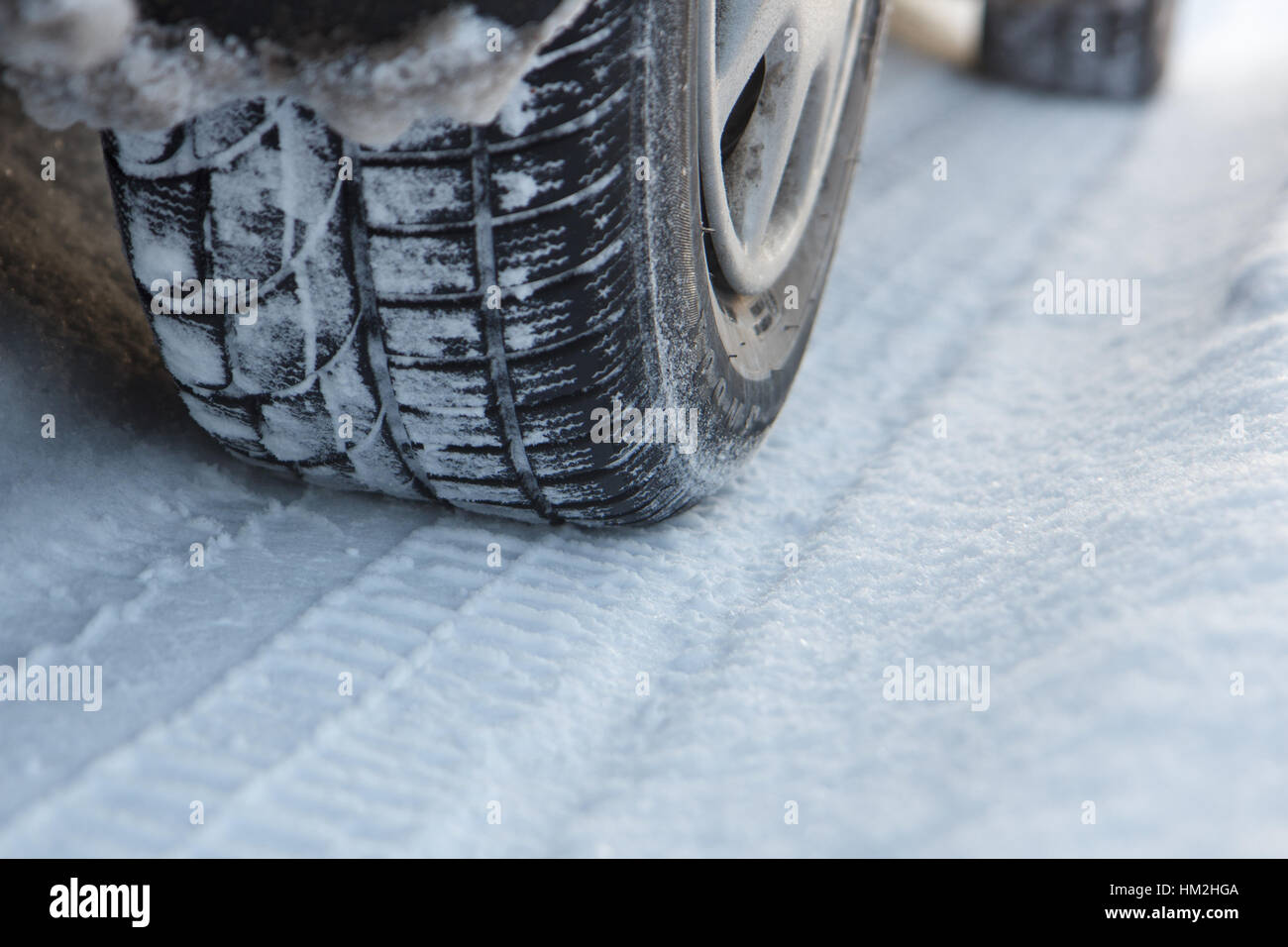 Car tracks in snow Stock Photo Alamy