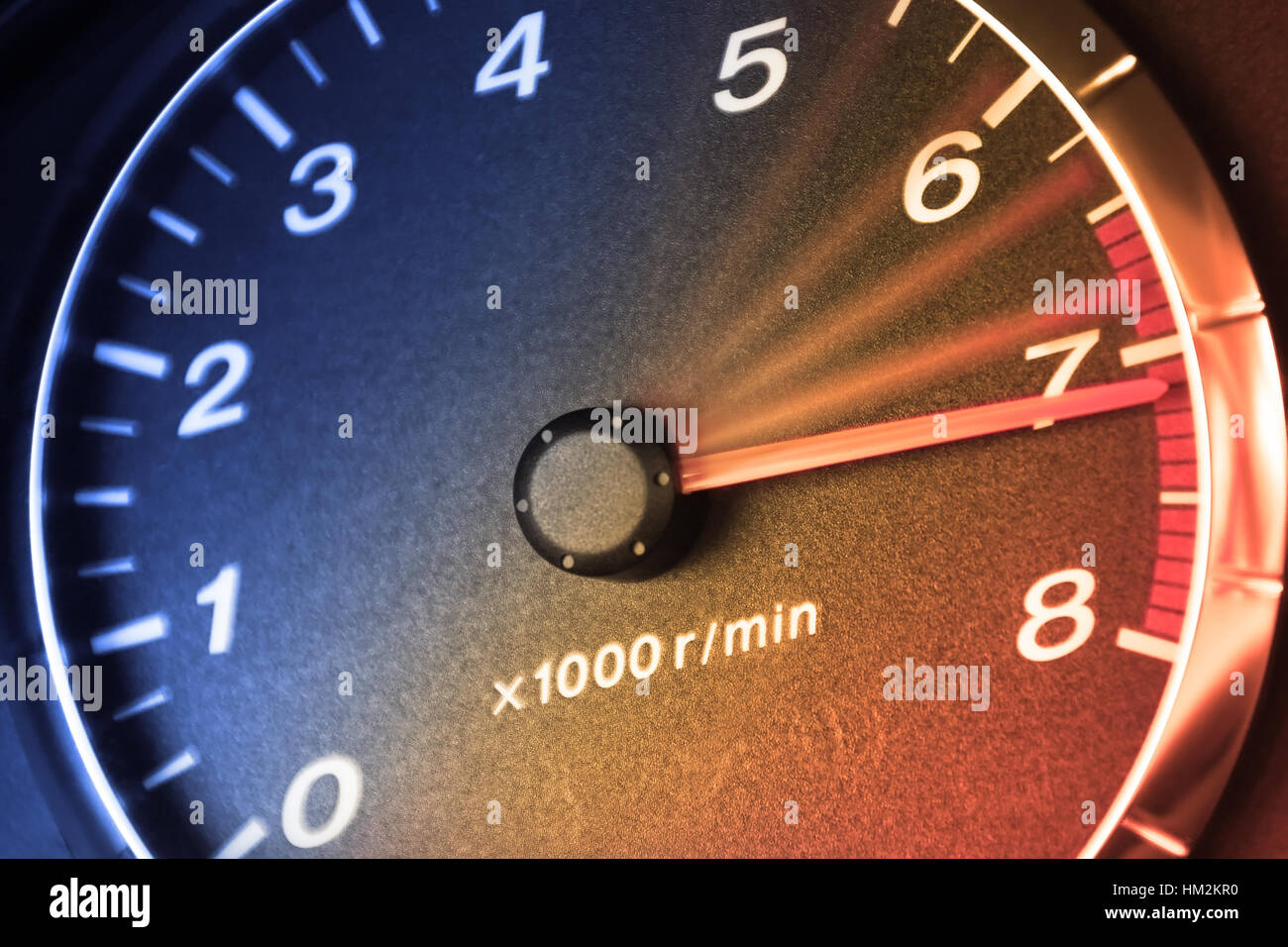 Arrow of tachometre in red zone Stock Photo