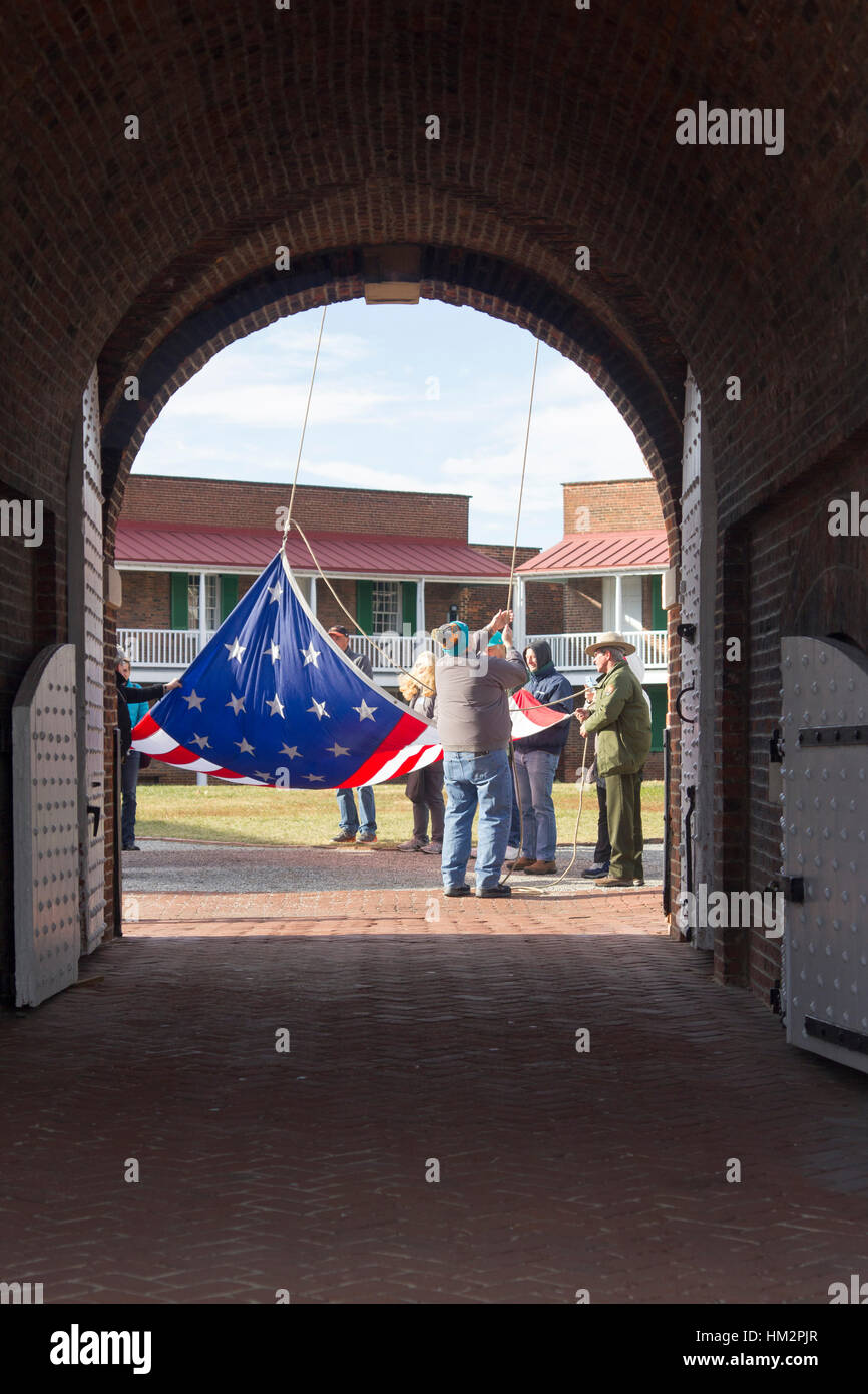 Visitors assist with raising of 15 star flag at Fort McHenry; Baltimore Stock Photo