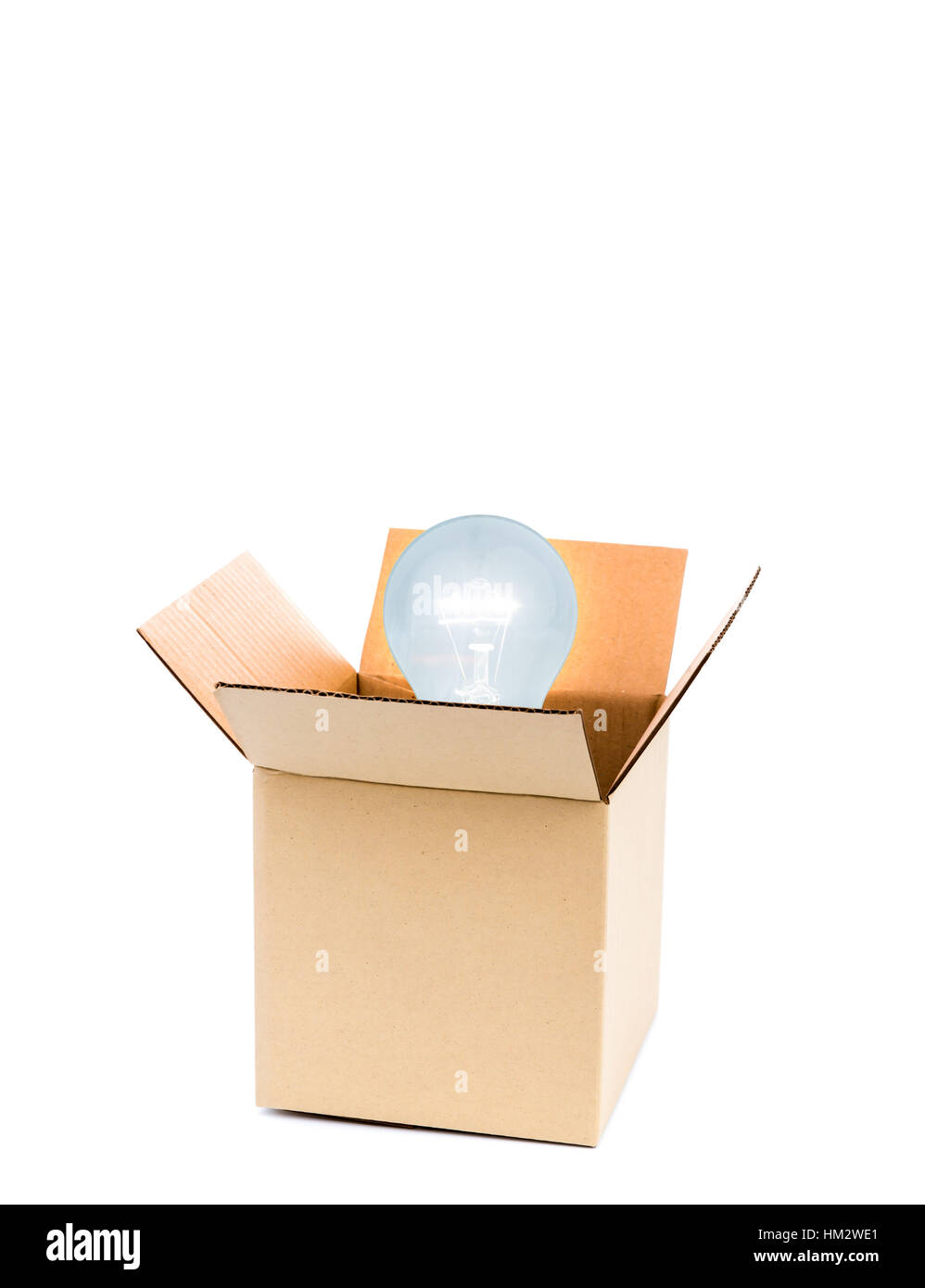 Glowing light bulb over open cardboard box Stock Photo Alamy