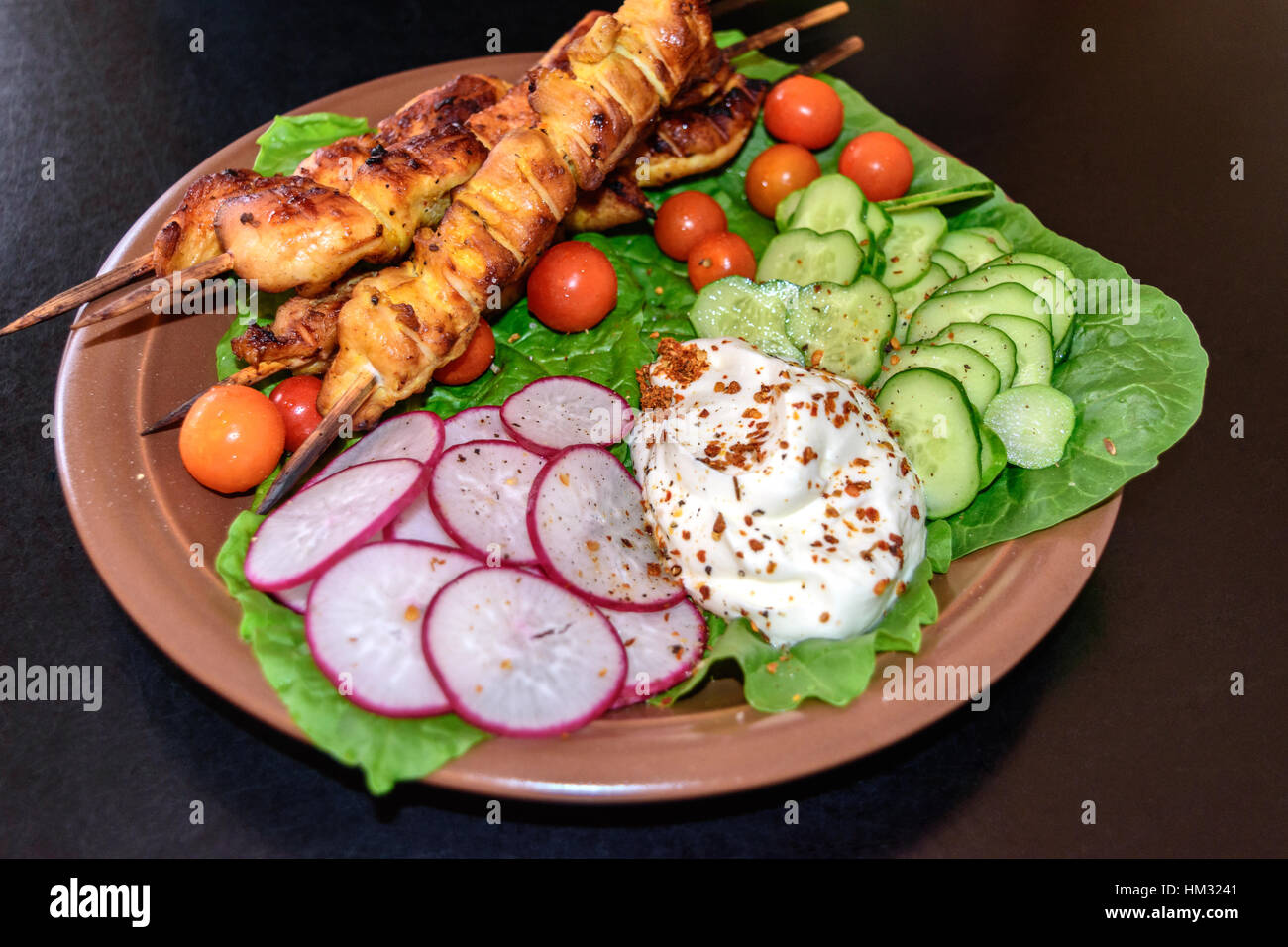Chicken kebab with homemade yogurt and vegetables Stock Photo Alamy