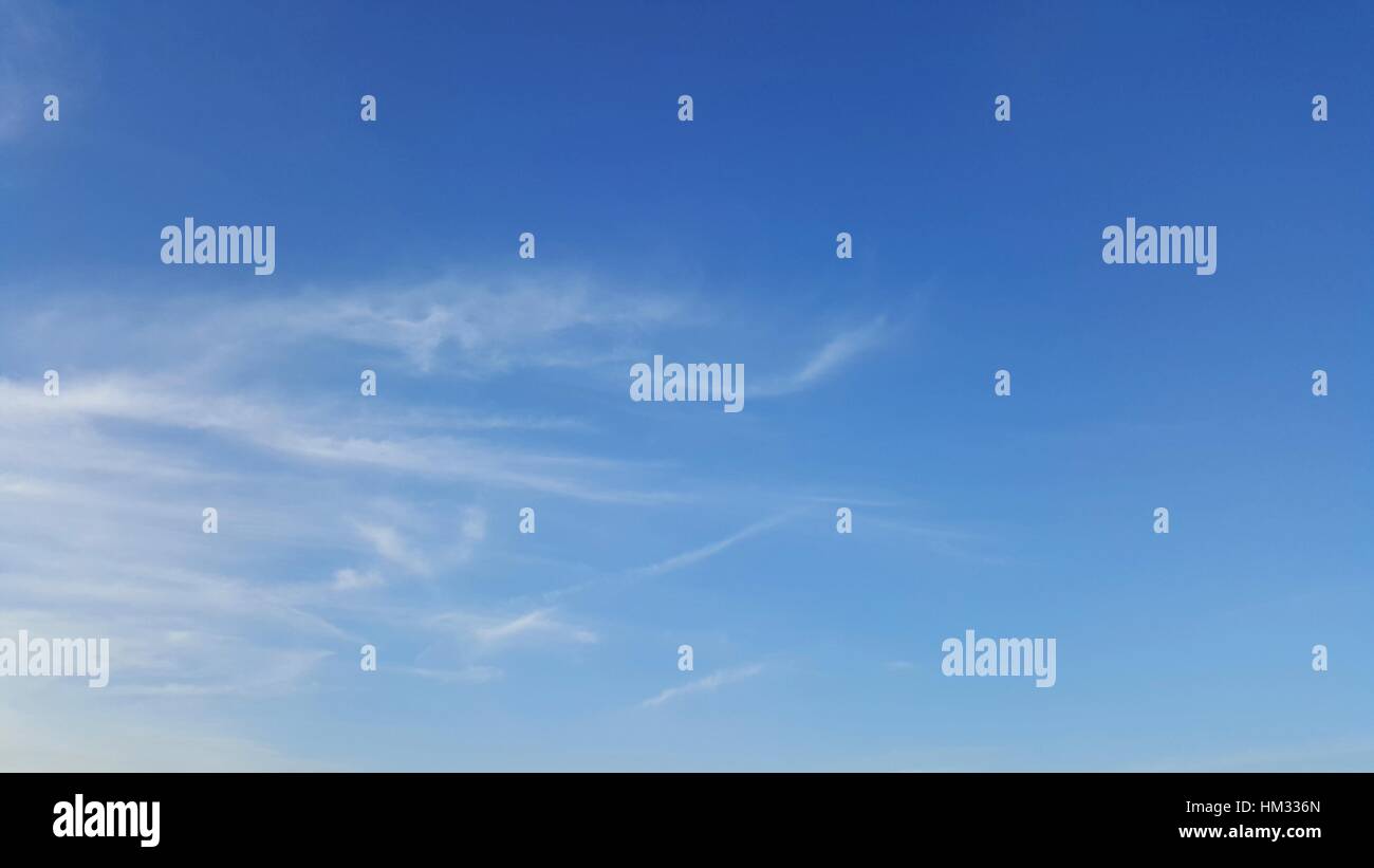 Clear blue sky with soft white cloud Stock Photo