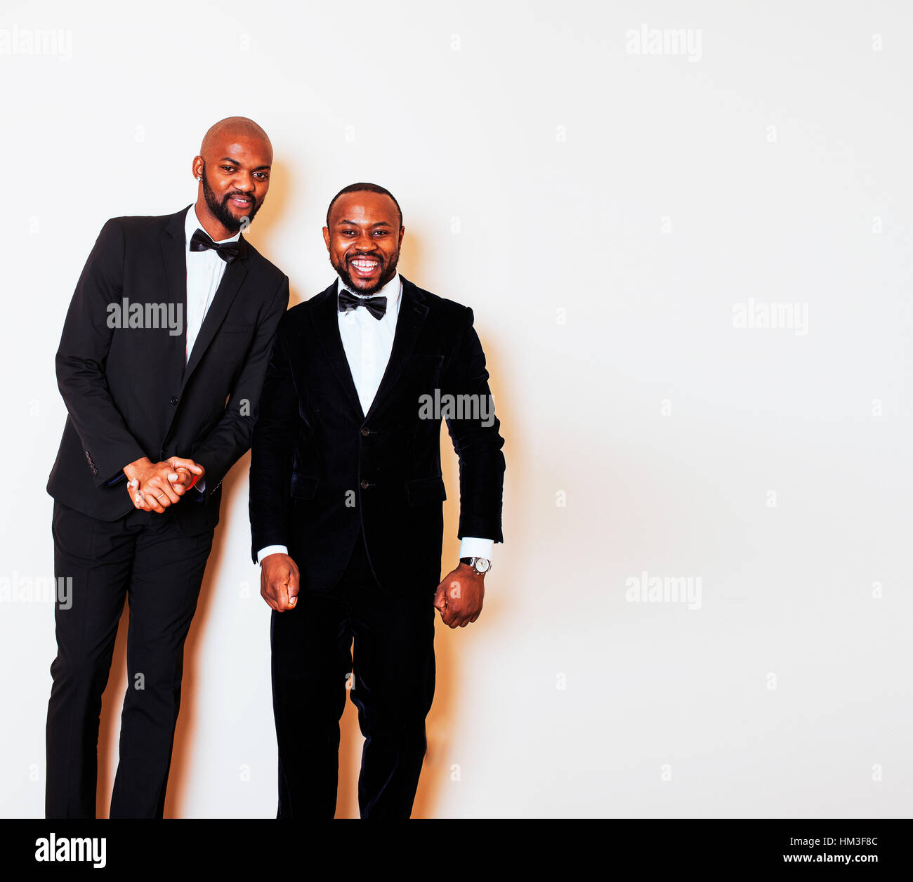 two afro-american businessmen in black suits emotional posing, g Stock ...
