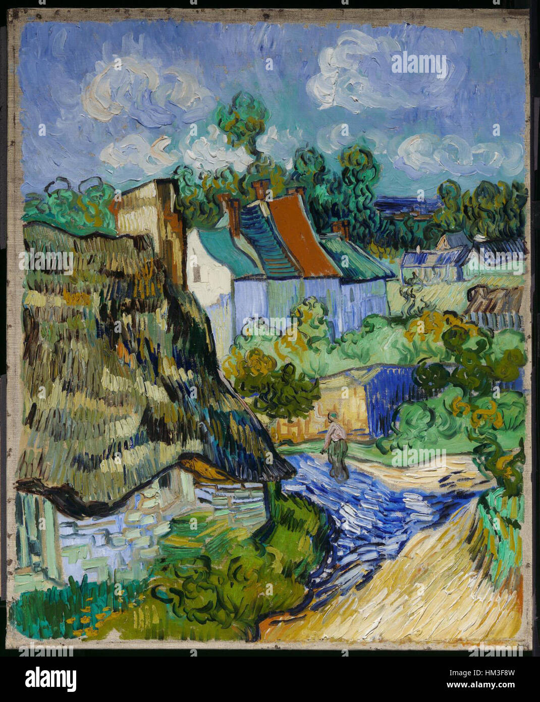 Vincent van Gogh's painting *Houses at Auvers* depicts the rural French village of Auvers-sur-Oise, where the artist lived in the final months of his life. The piece showcases Van Gogh's characteristic brushwork and vibrant colors. Stock Photo