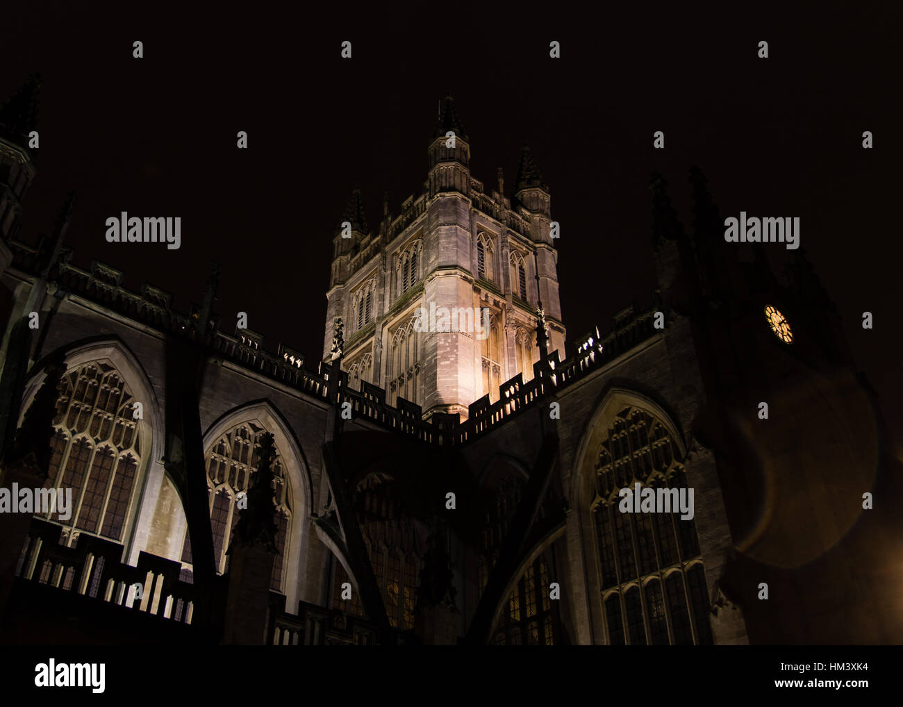 Bath Abbey tower and clock at night, from north. One of Britain's