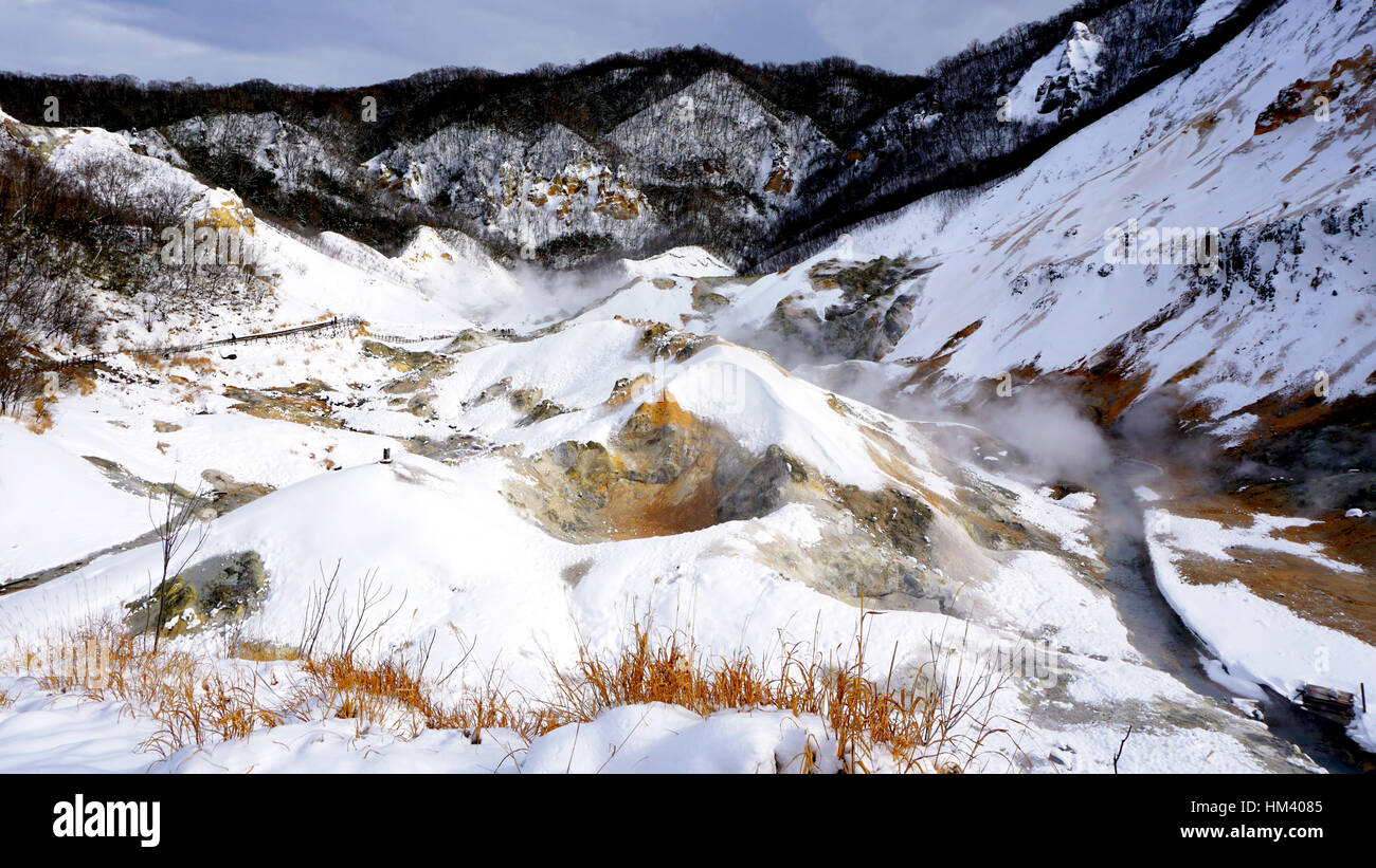 Noboribetsu onsen hell valley snow winter landscape national park in Jigokudani, Hokkaido, Japan Stock Photo