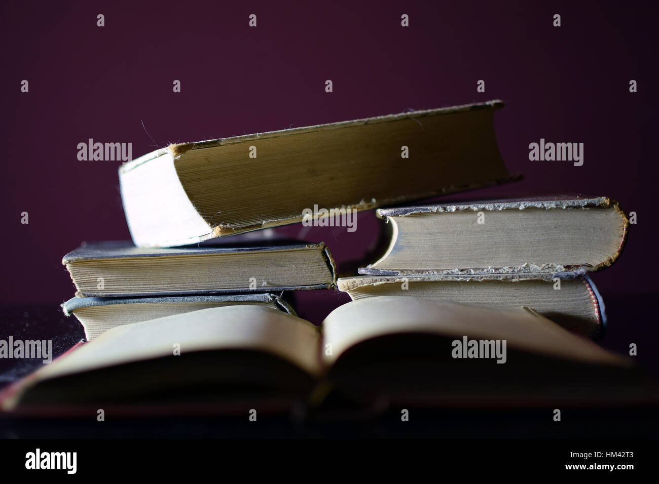 Pile of old books. Focus on background. Stock Photo