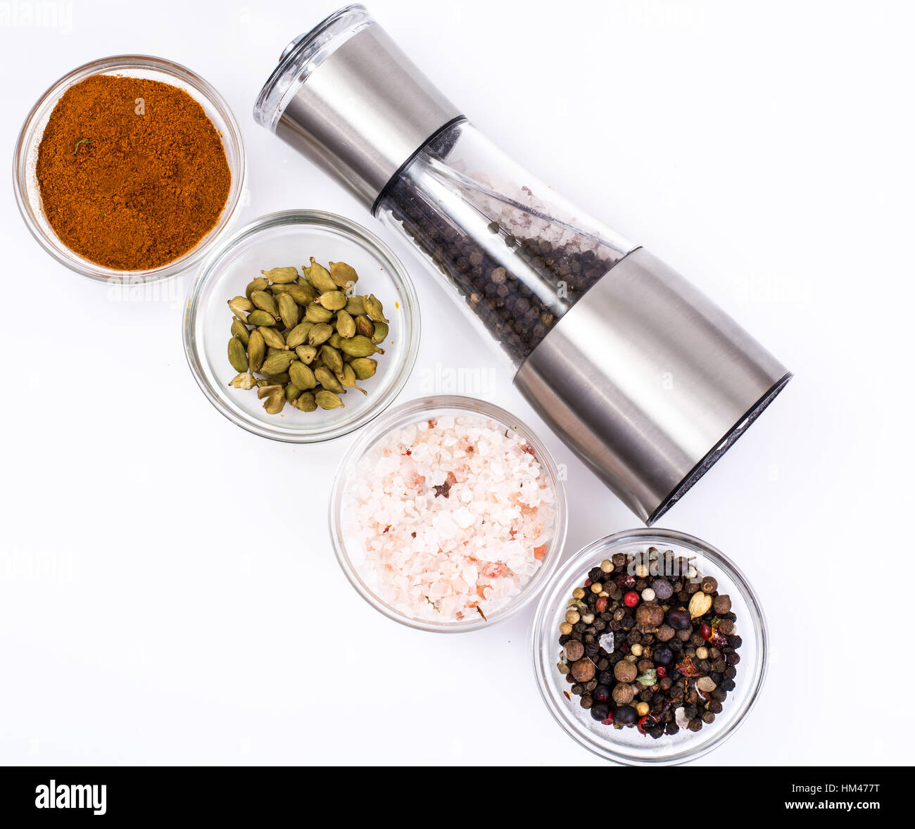 Mortar with pestle and mill for spices Stock Photo Alamy