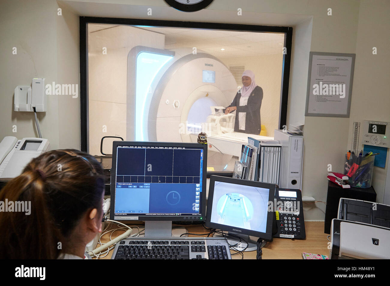 Nurse preparing for an MRI scan in a hospital in London, UK. Stock Photo